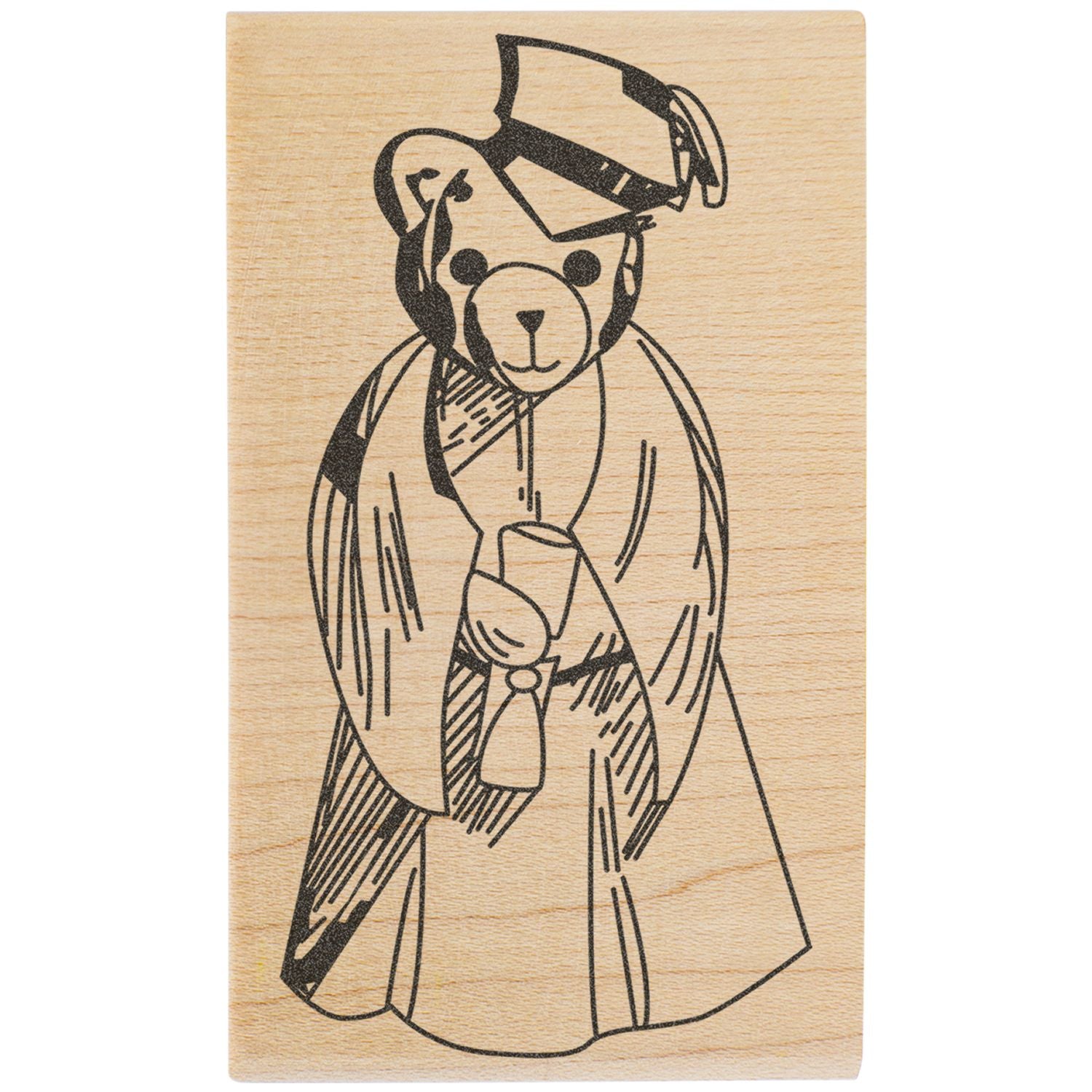 Teddy bear graduation illustration on wooden stamp with cap, gown, and diploma.