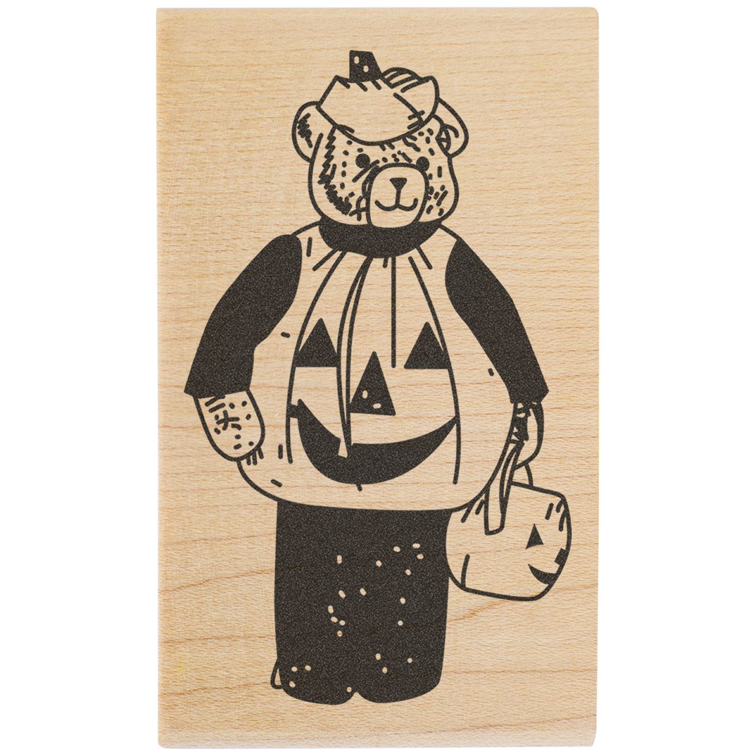 Cute bear in a Halloween pumpkin costume holding a trick-or-treat bag, engraved on wood.