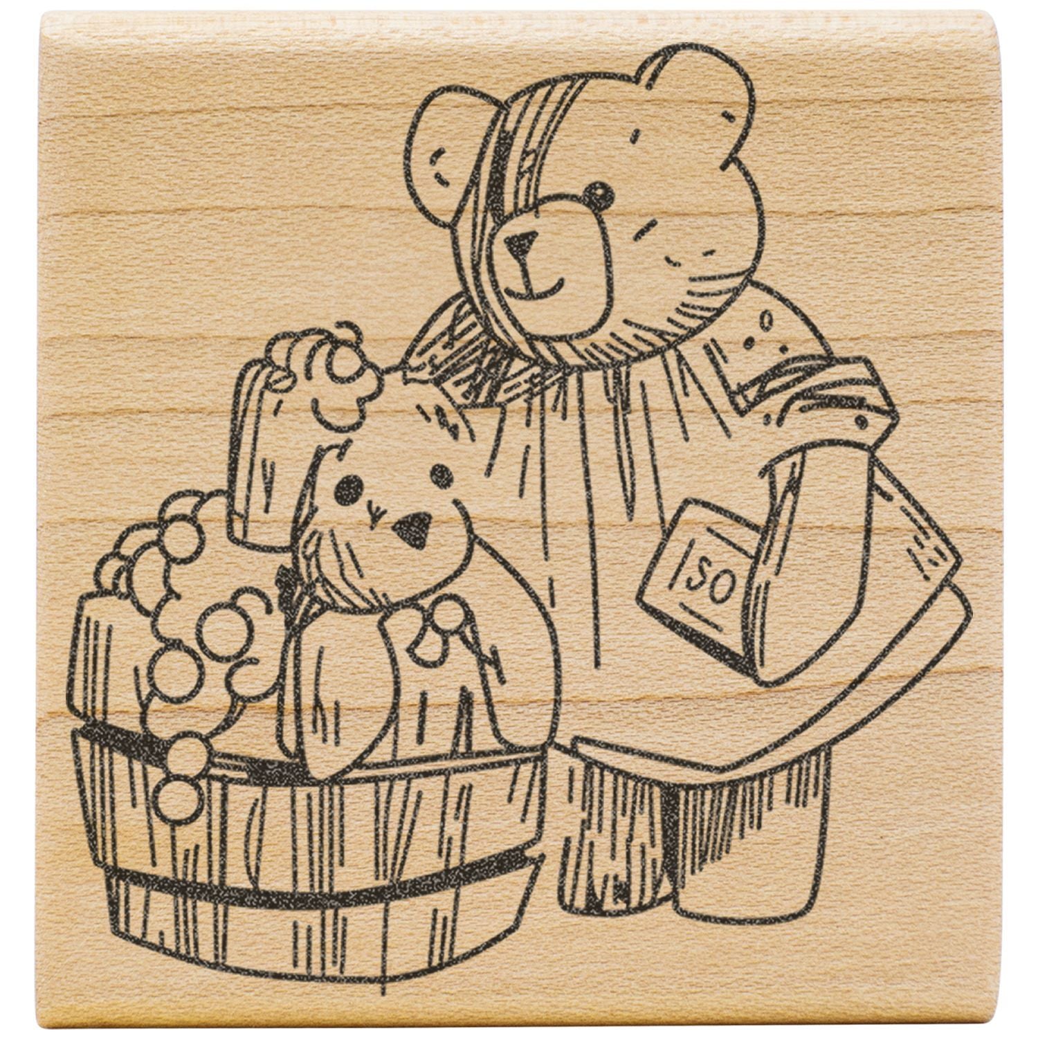 Cute teddy bear wooden stamp with hand-drawn illustration on a natural wood block