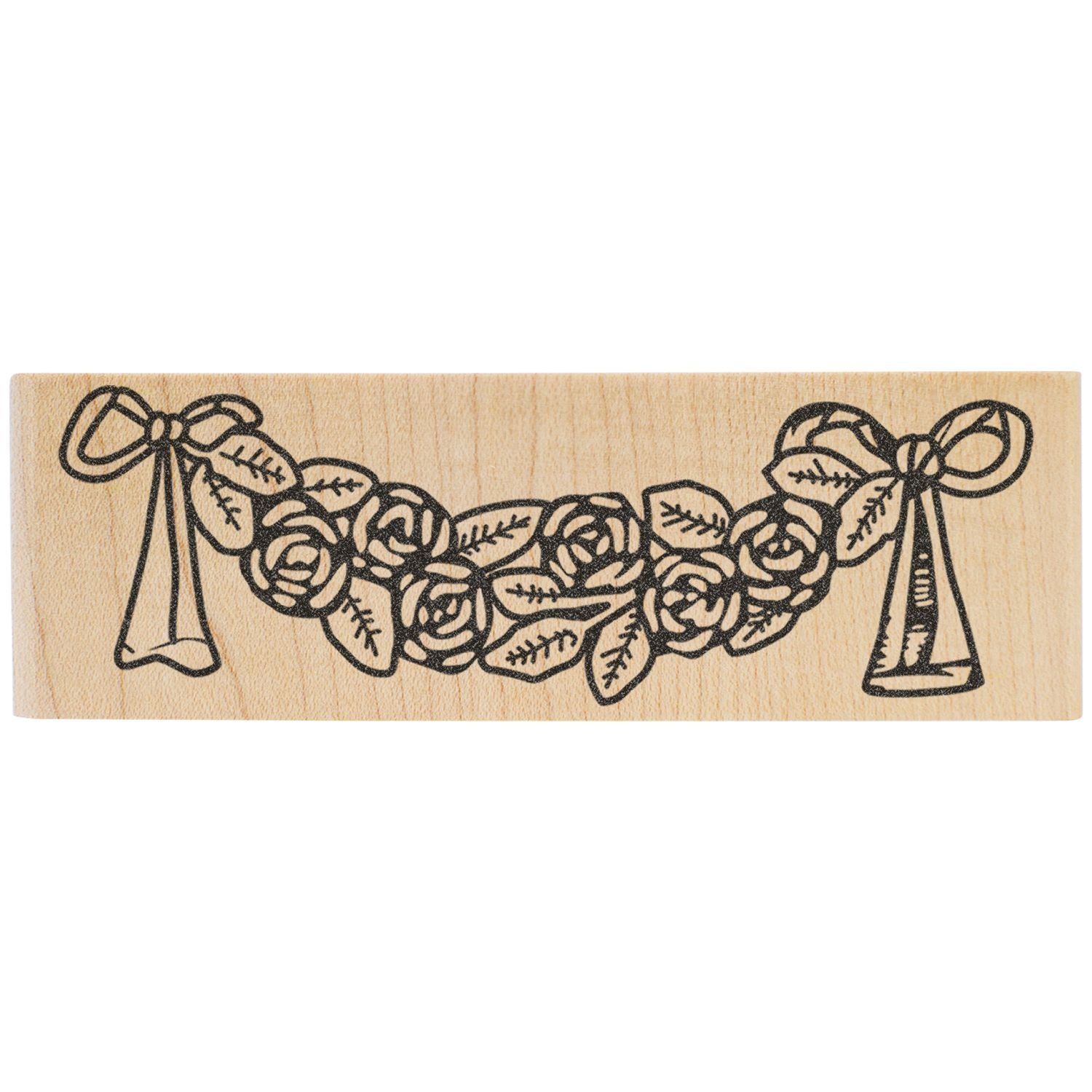 Wooden rubber stamp with floral bow garland design for DIY crafts and scrapbooking.