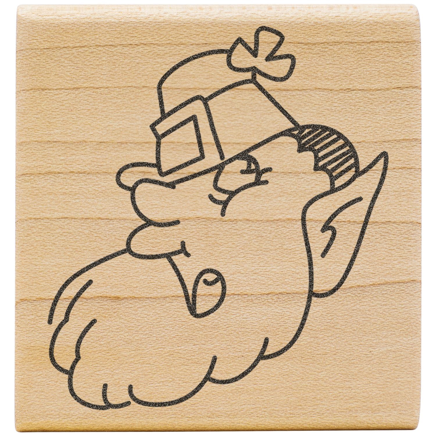 Cute hand-drawn cartoon sheep engraved on a wooden block.