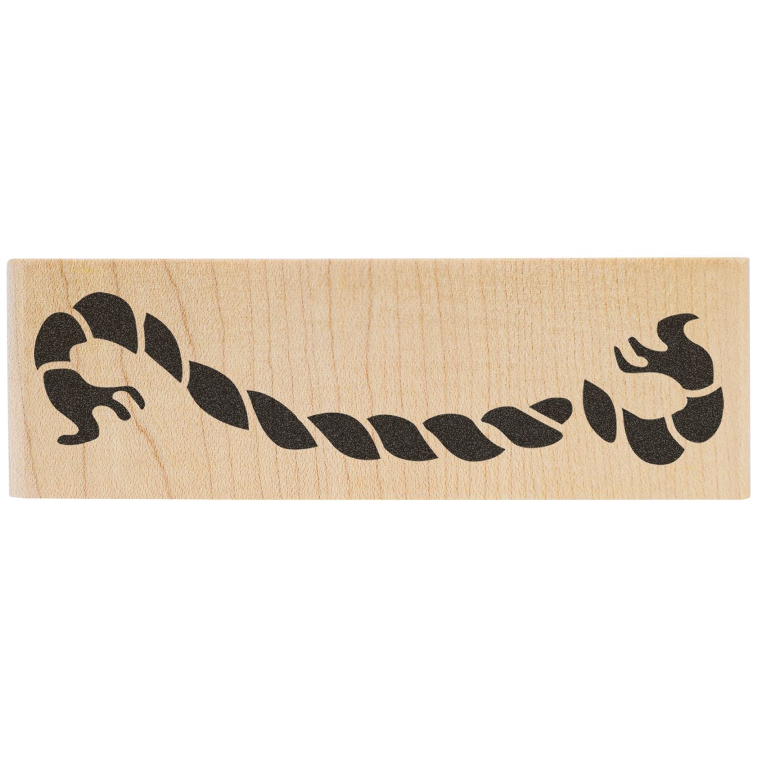 Black scorpion silhouette engraved on a natural wood block, decorative rustic design.
