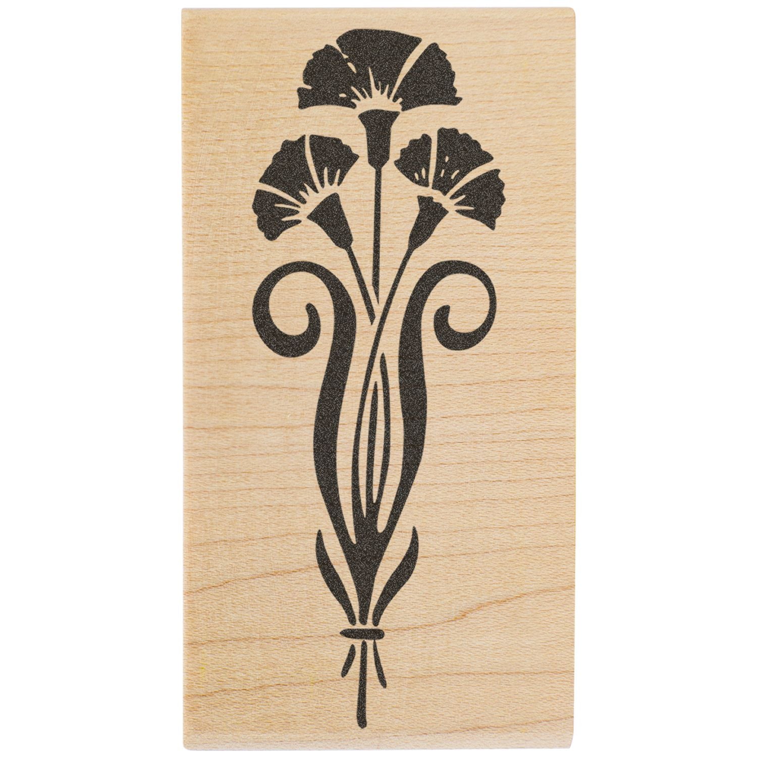 Art Nouveau floral design engraved on a wooden stamp block with black botanical motif.
