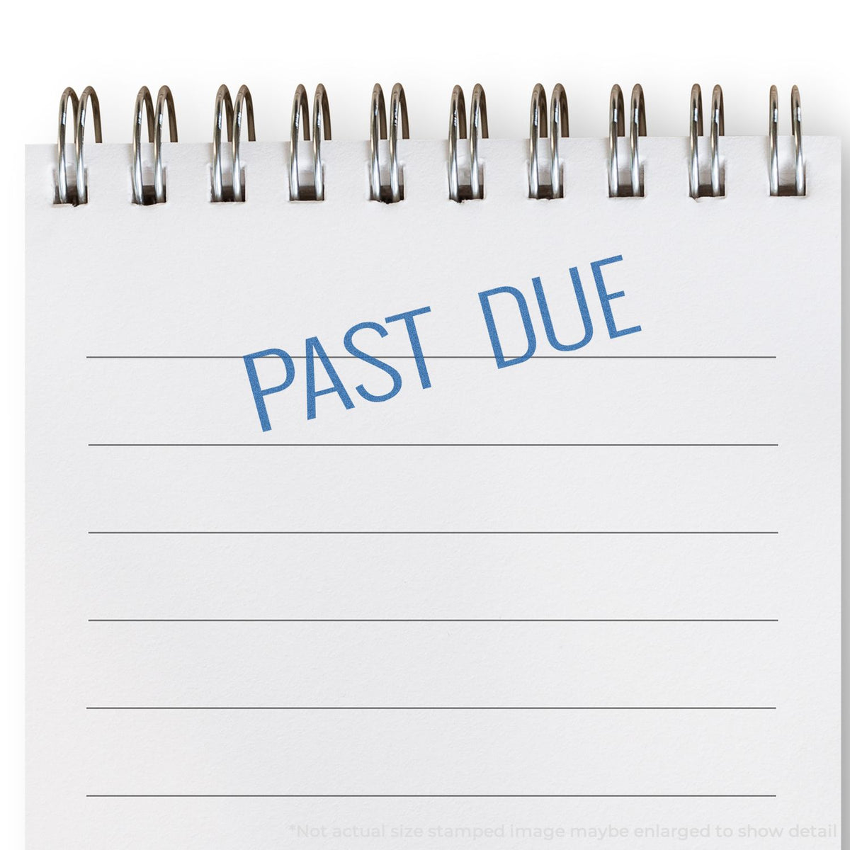 Past due notice stamp on paperwork with binder rings, highlighting overdue payment status.
