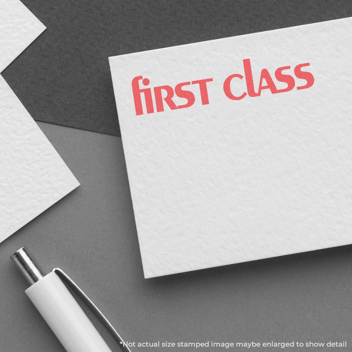 First Class stamped letter card with red text and pen on gray background, promoting fast, premium delivery service for everyday mail.