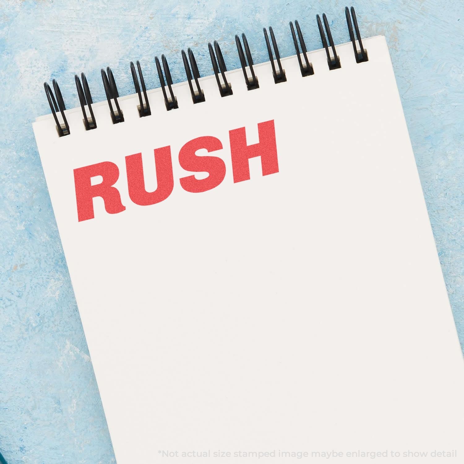 RUSH message on a spiral notepad, highlighting urgent priority shipping or service for quick delivery promotions