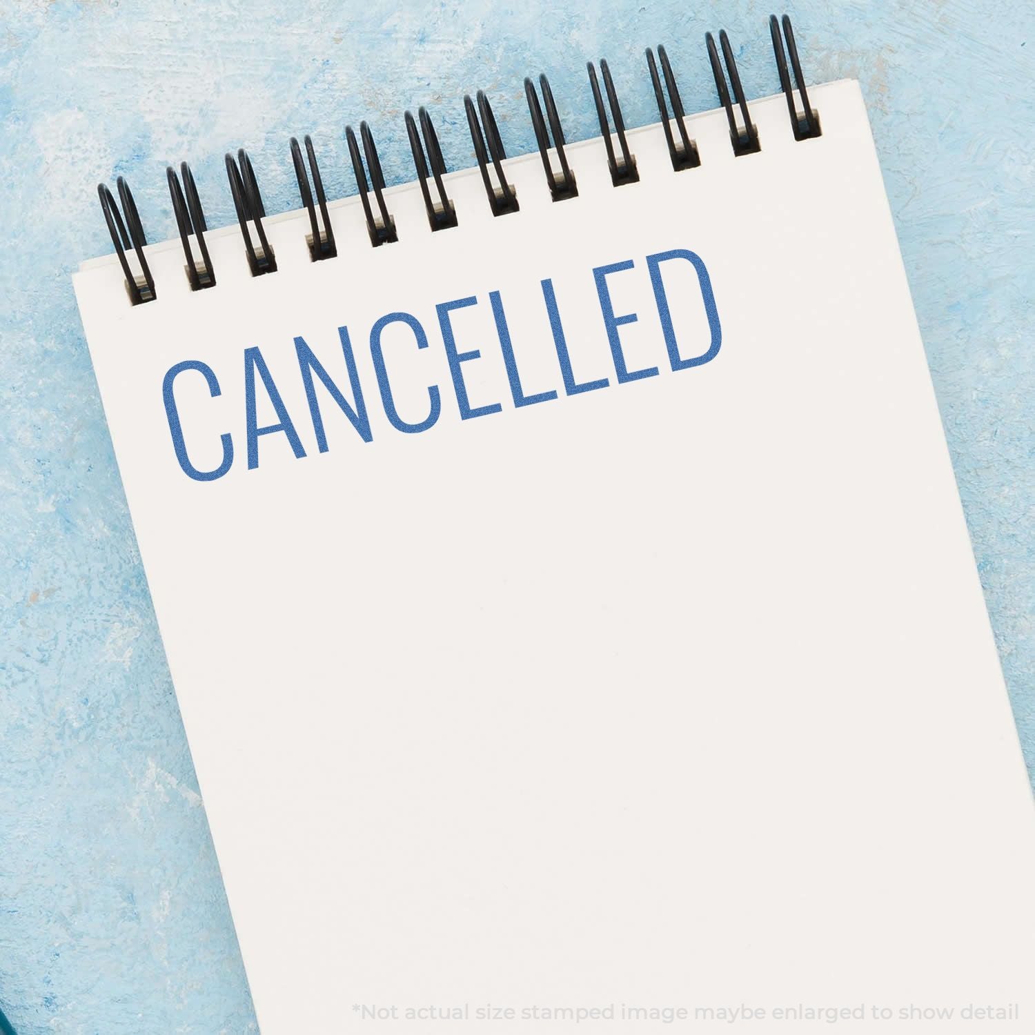 Cancelled calendar page reading CANCELLED on a spiral-noted sheet, indicating an event or appointment is canceled.