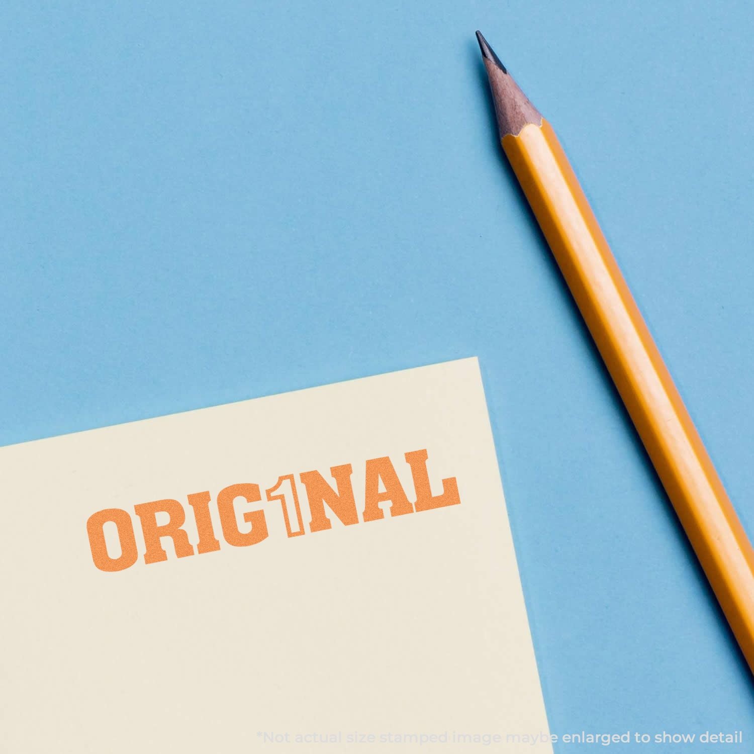 Pencil beside an ORIGINAL note on blue background, emphasizing authenticity, creativity, and branding design.