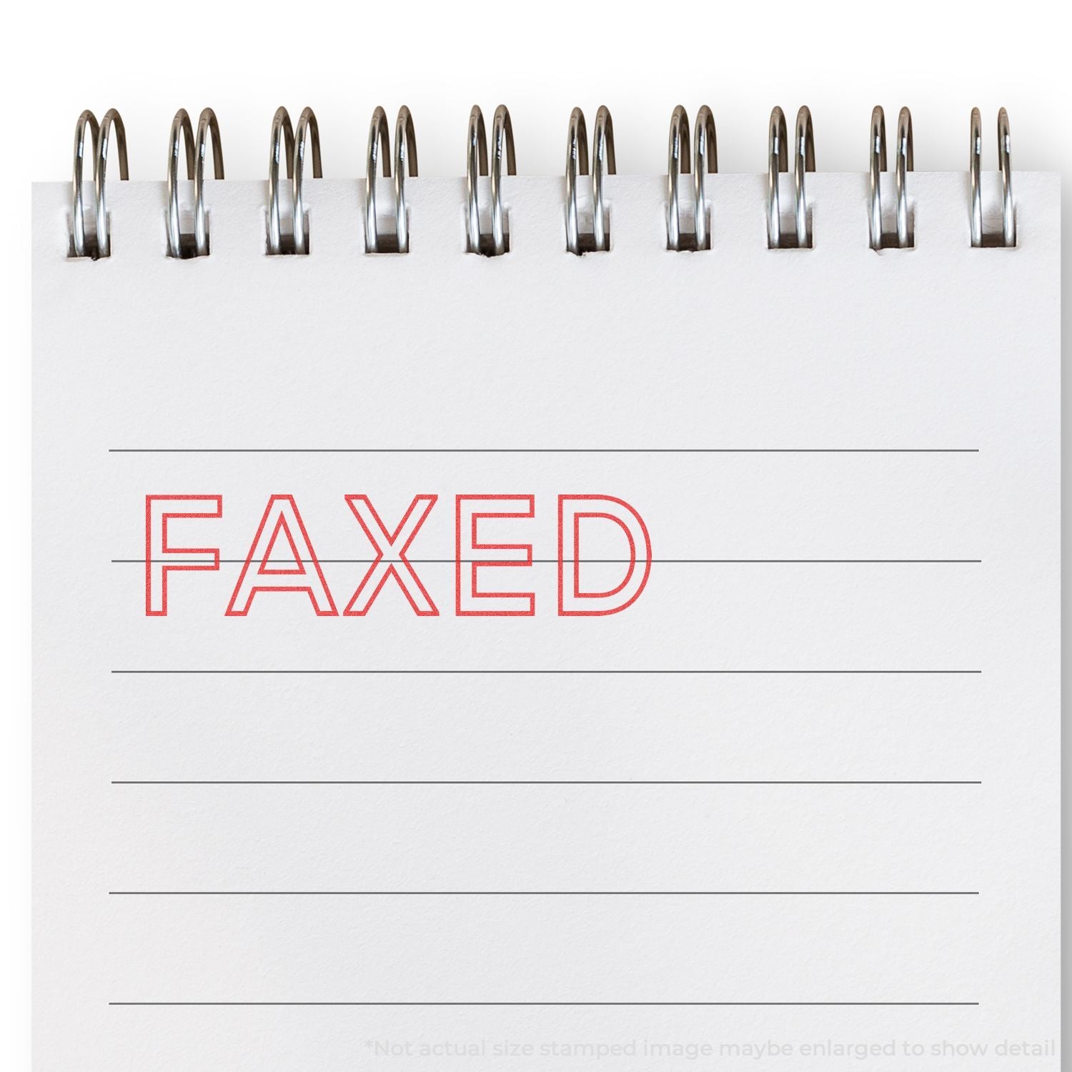 FAXED stamp on paper with staples, indicating a document has been sent by fax and processed.