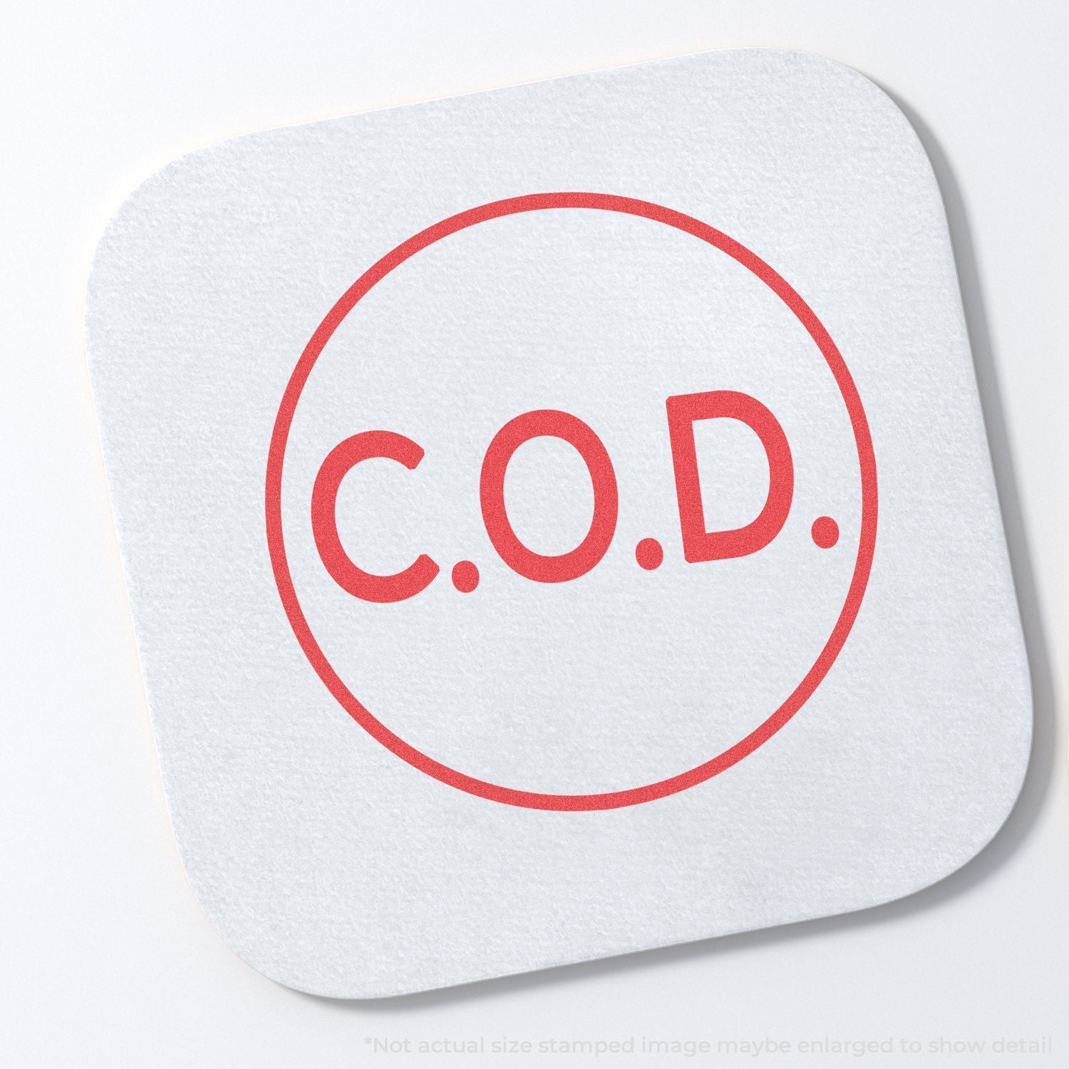 COD logo stamped in a red circle on a white paper coaster, representing COD services or products branding.