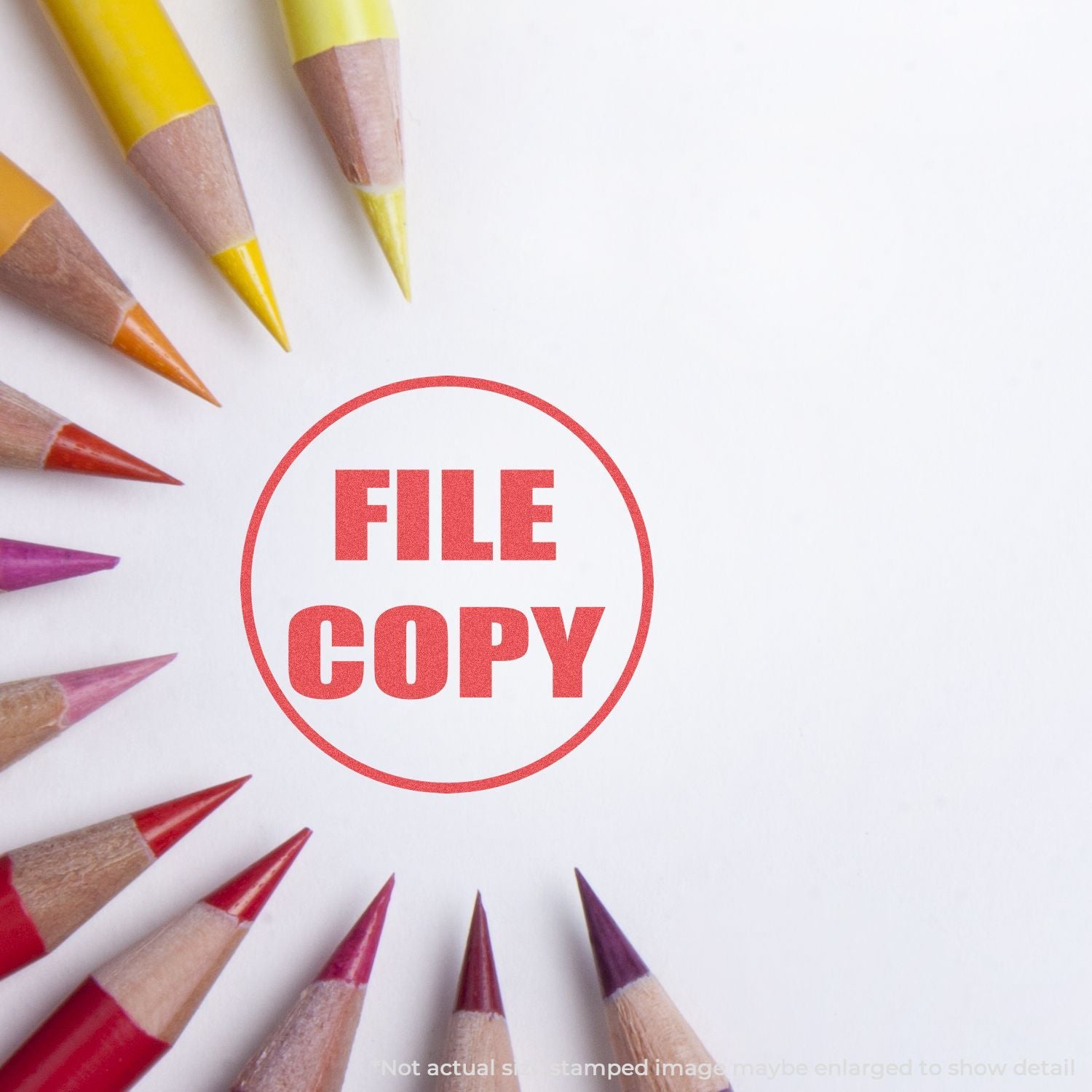 FILE COPY stamp on white paper with colored pencils, highlighting document copying, office filing, and print verification for office documents.