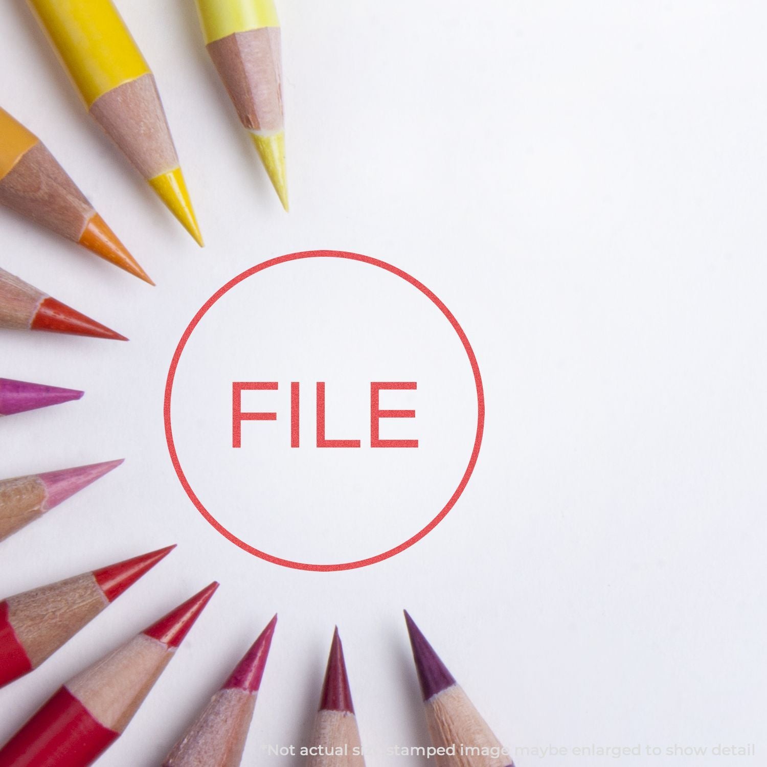 FILE text icon inside red circle with colored pencils around it, representing writing, education, and printable file resources.