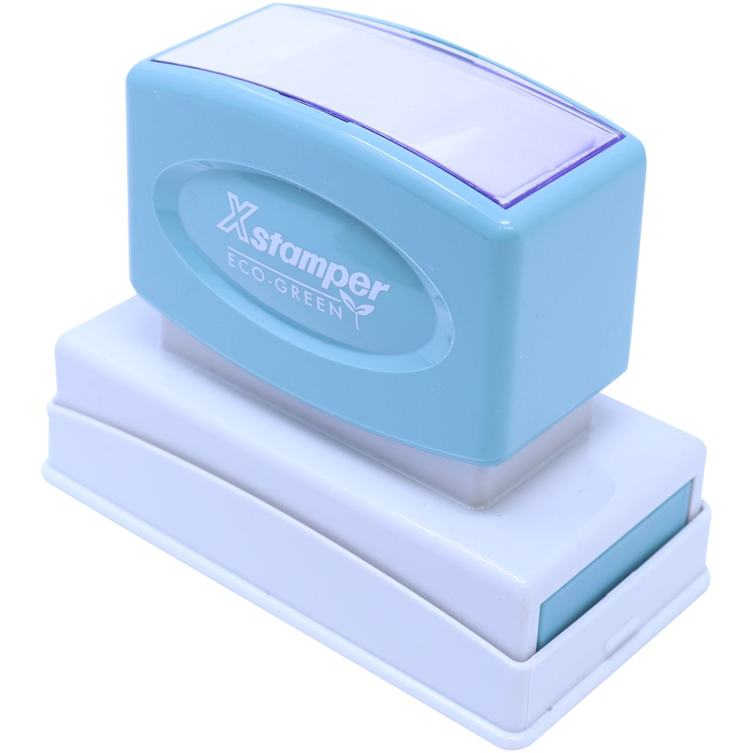 Eco-friendly Xstamper Eco-GREEN stamp on white base, compact self-inking date and logo impression device for office labeling and packaging.