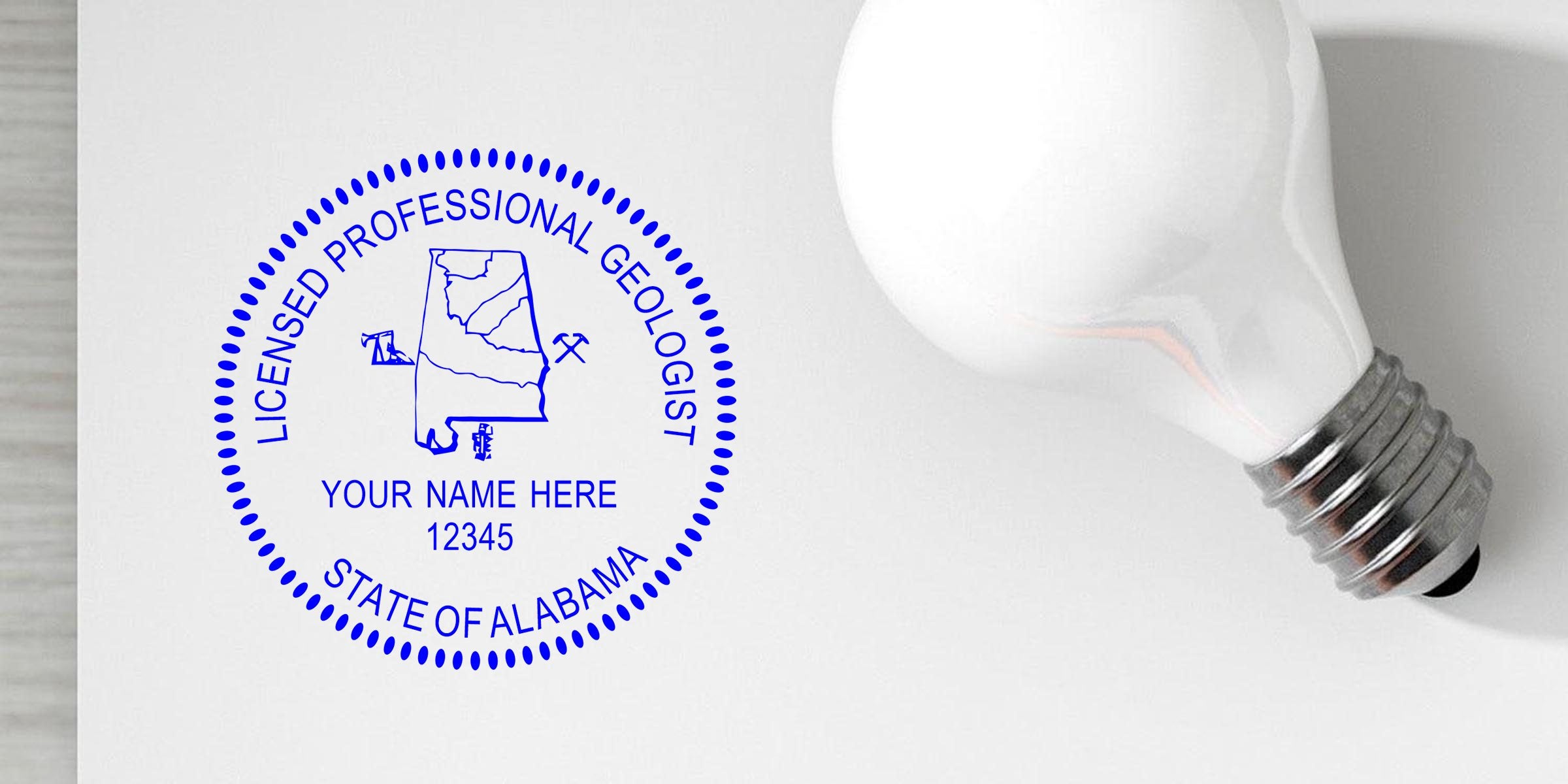 Custom geologist stamp with Alabama geologist seal and light bulb on white background.