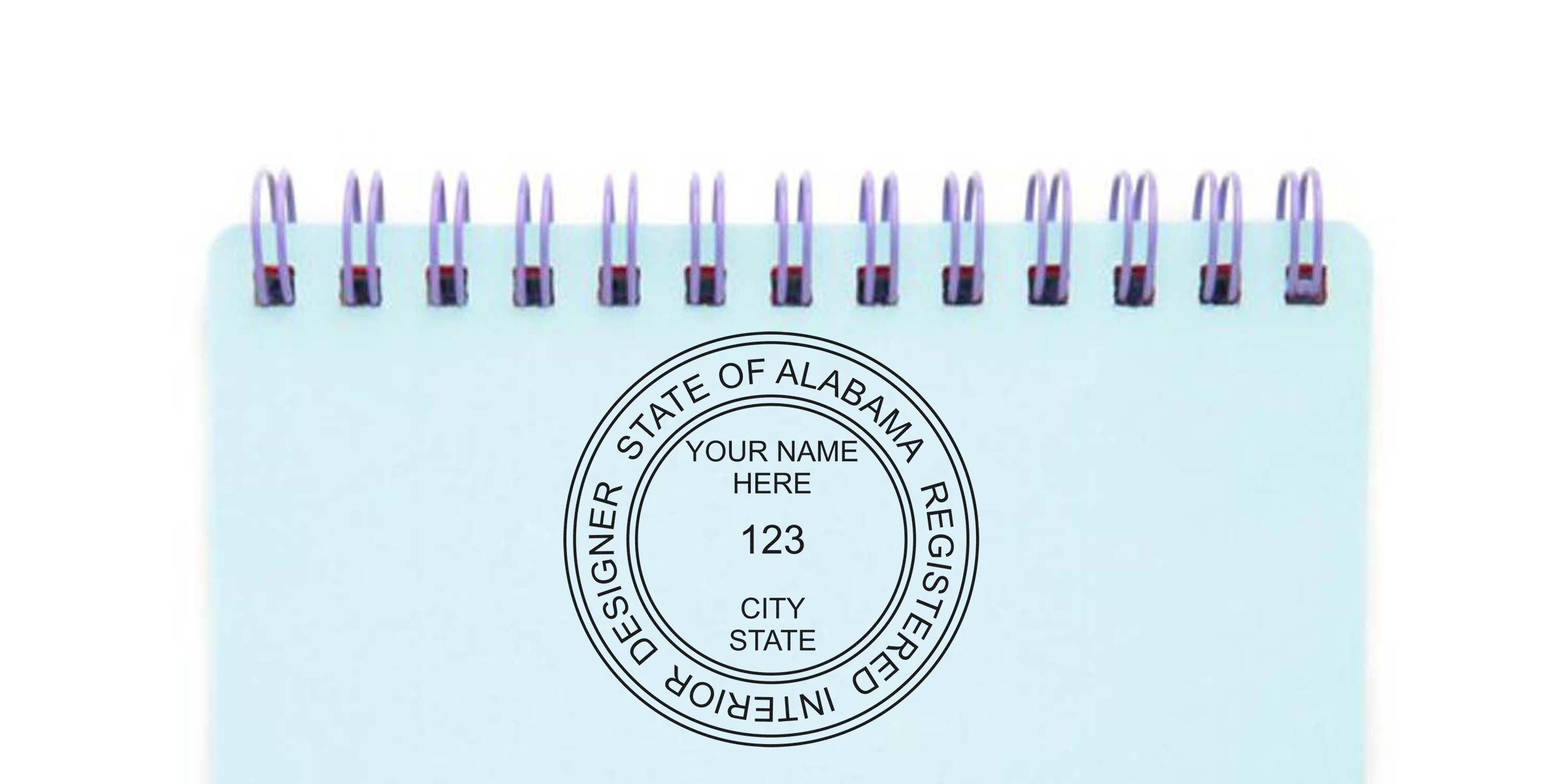 Custom Interior Designer Alabama stamp on spiral notebook, symbolizing certification and licensing, highlighting the simplified Interior Design Process.