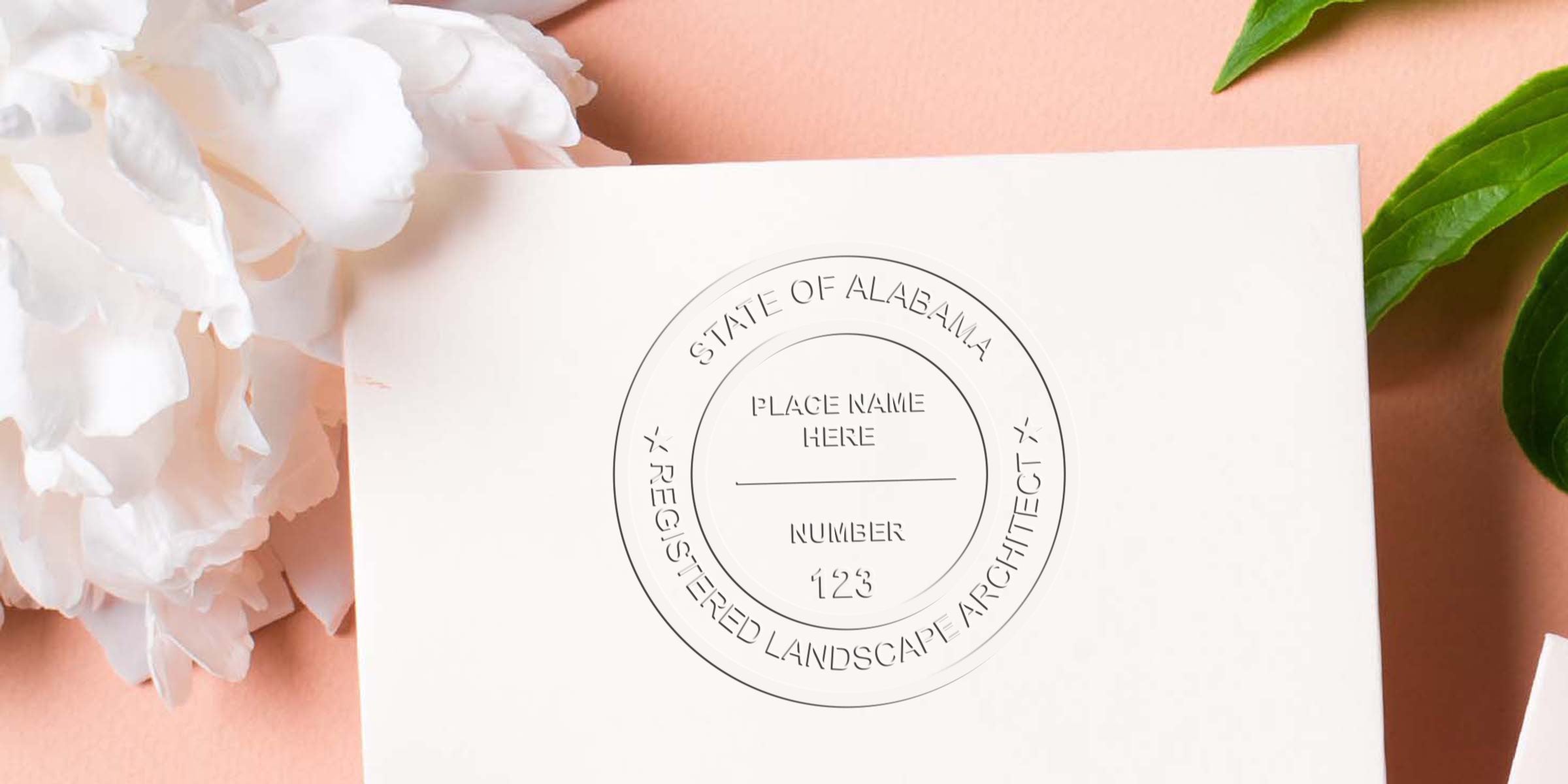Alabama registered landscape architect seal on white paper, surrounded by flowers and green leaves, highlighting Alabama landscape architect regulations and stamp requirements.