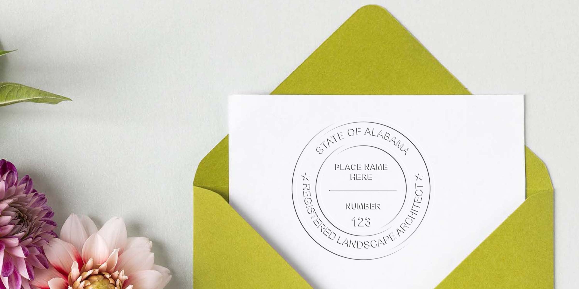 Alabama landscape architect seal on white paper inside a green envelope with flowers, symbolizing Alabama landscape architect licensing.