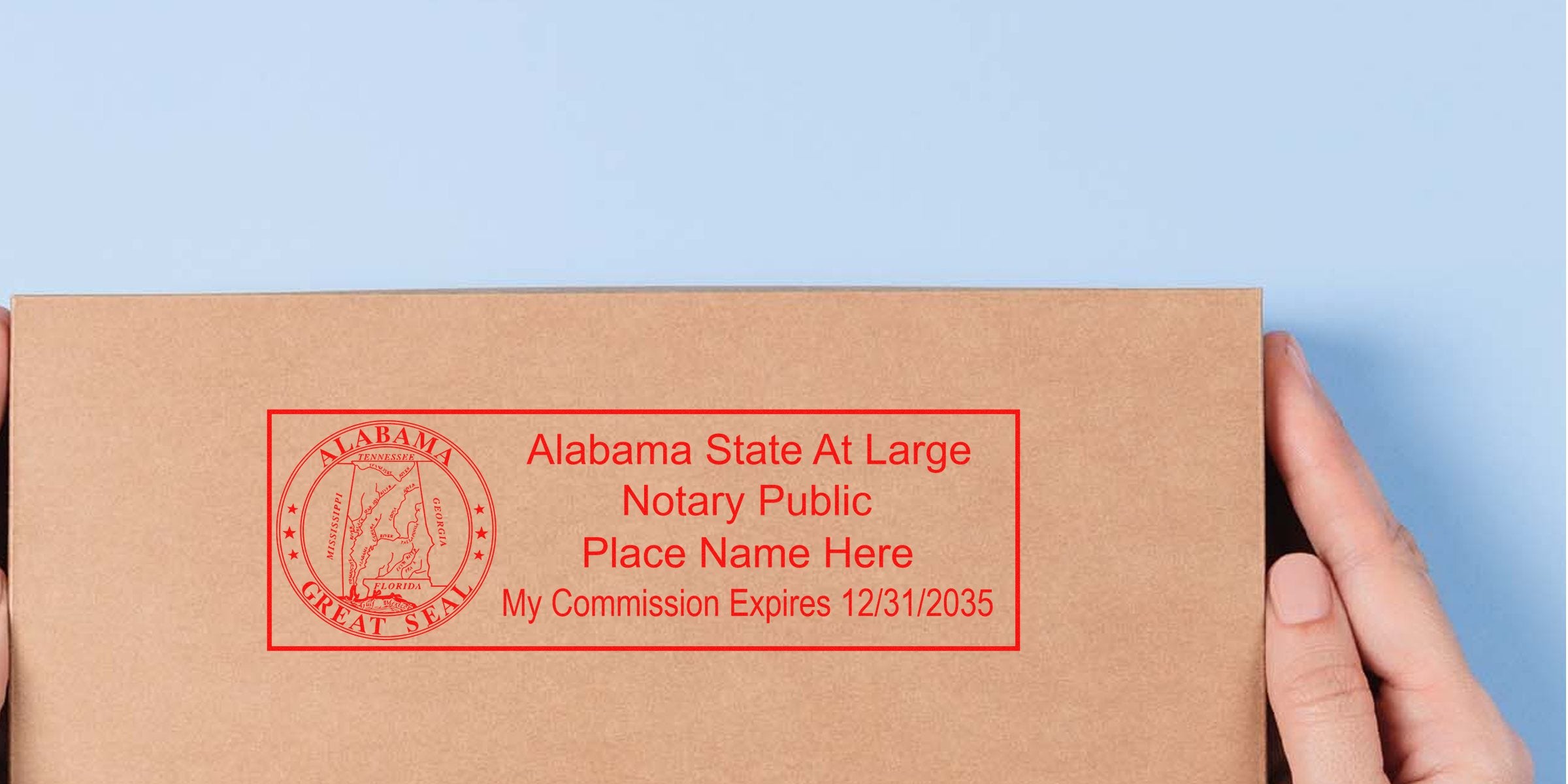 Alabama notary supplies with State At Large Notary Public stamp on brown envelope showing commission expiration date, highlighting essential notary public items in Alabama.