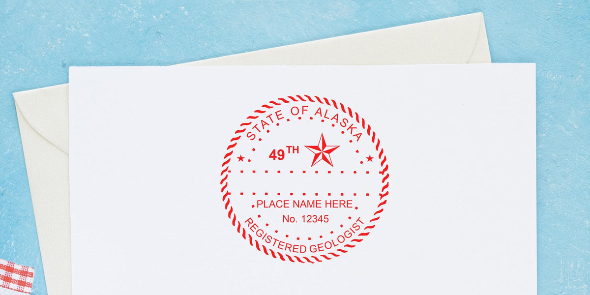 Alaska geologist stamp on white paper with envelope, set against blue background, showing Alaska registered geologist stamp and geologist stamp template.