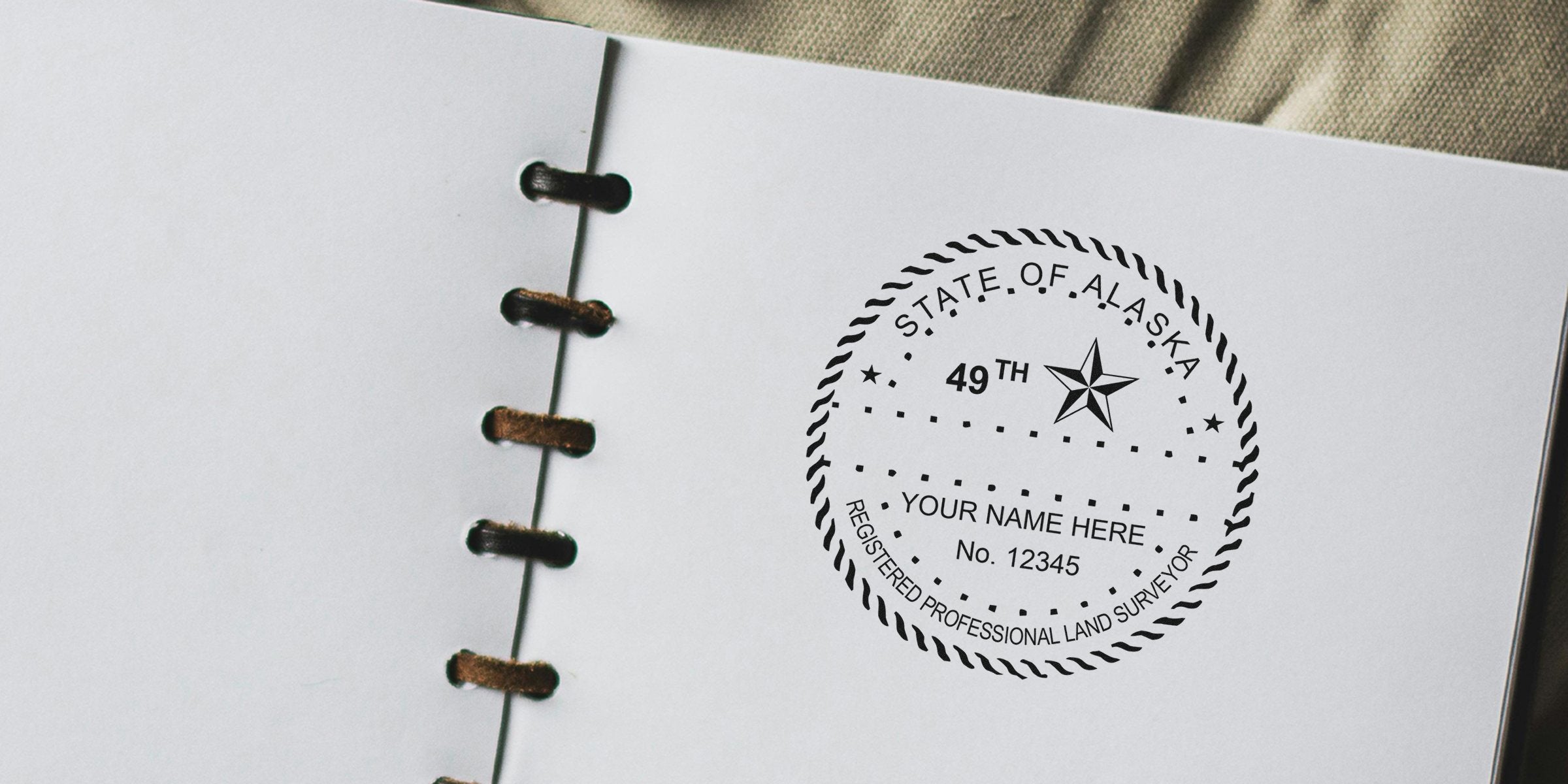 Alaska land surveyor stamp on white paper, showcasing professional registered surveying services with clear, authentic stamp design tips.