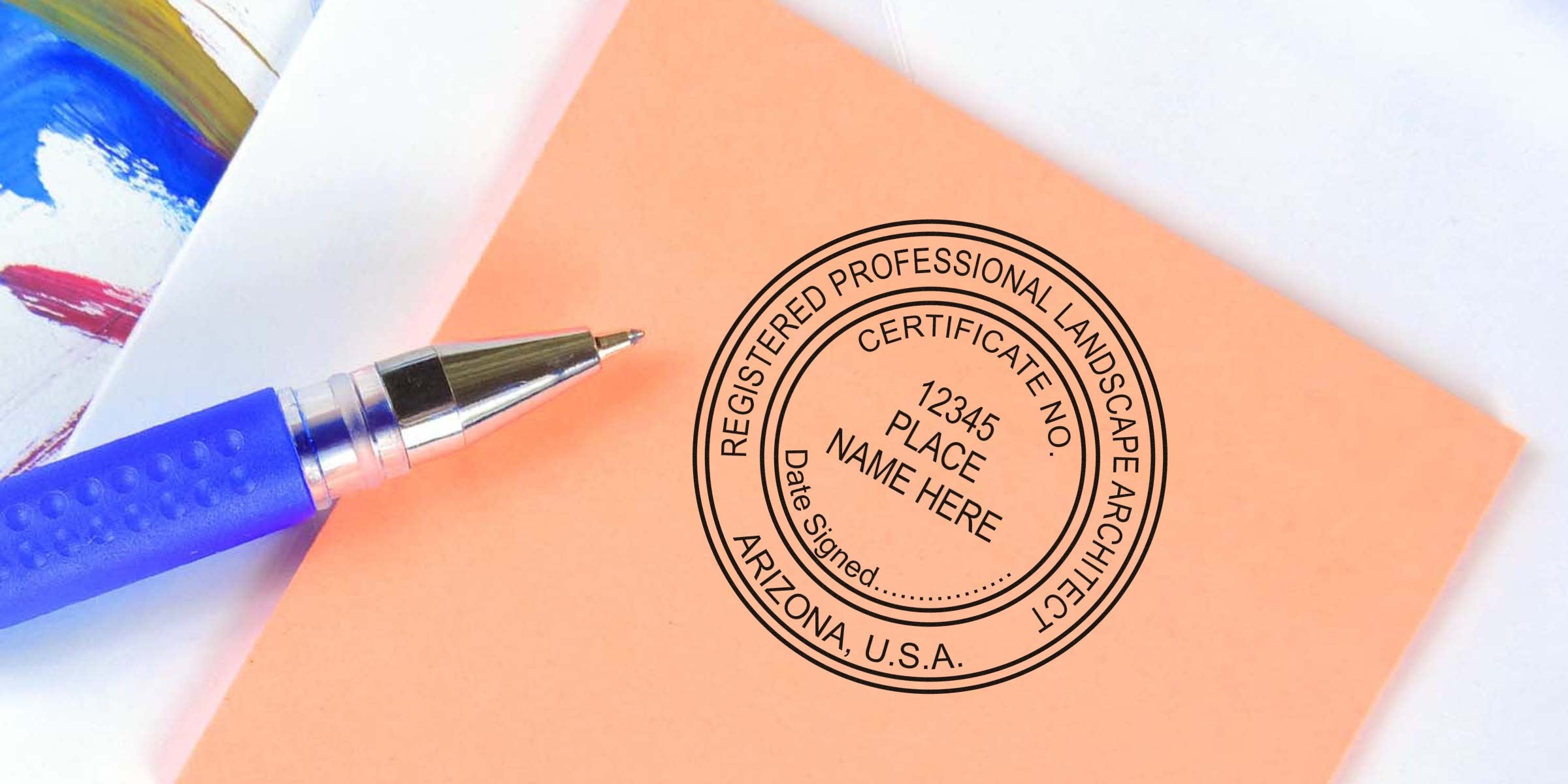 Blue pen next to registered Arizona landscape architect certificate stamp on peach paper, emphasizing seal requirements.