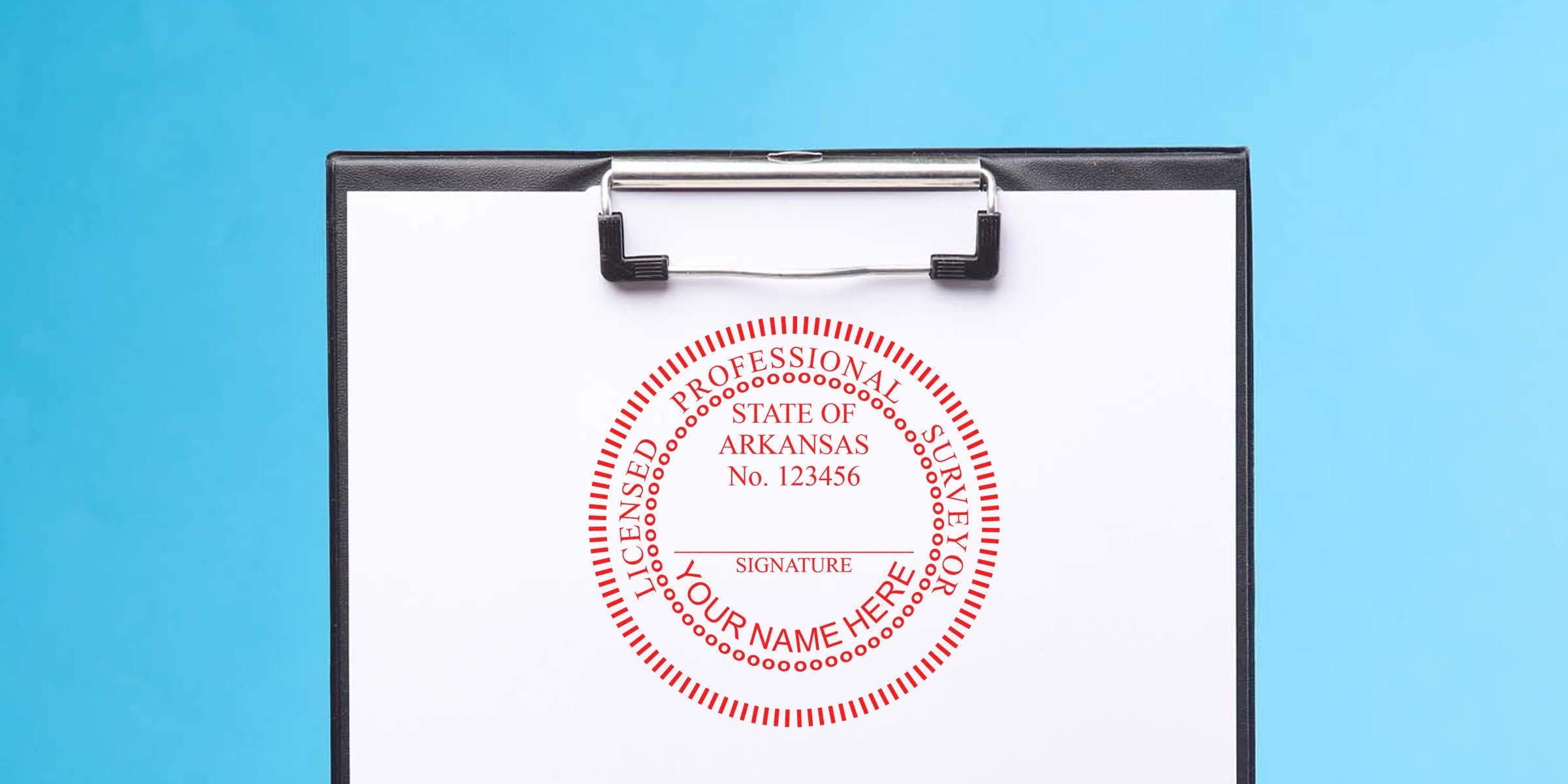 Arkansas Land Surveyor Stamp on clipboard for verifying Professional Land Surveyor certification and licensing in Arkansas.