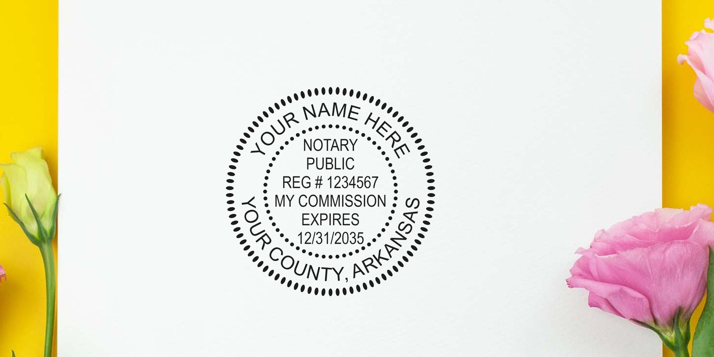 Custom Arkansas notary seal stamp with commission expiration date on white paper, framed by pink and yellow flowers. Order your notary seal online today.
