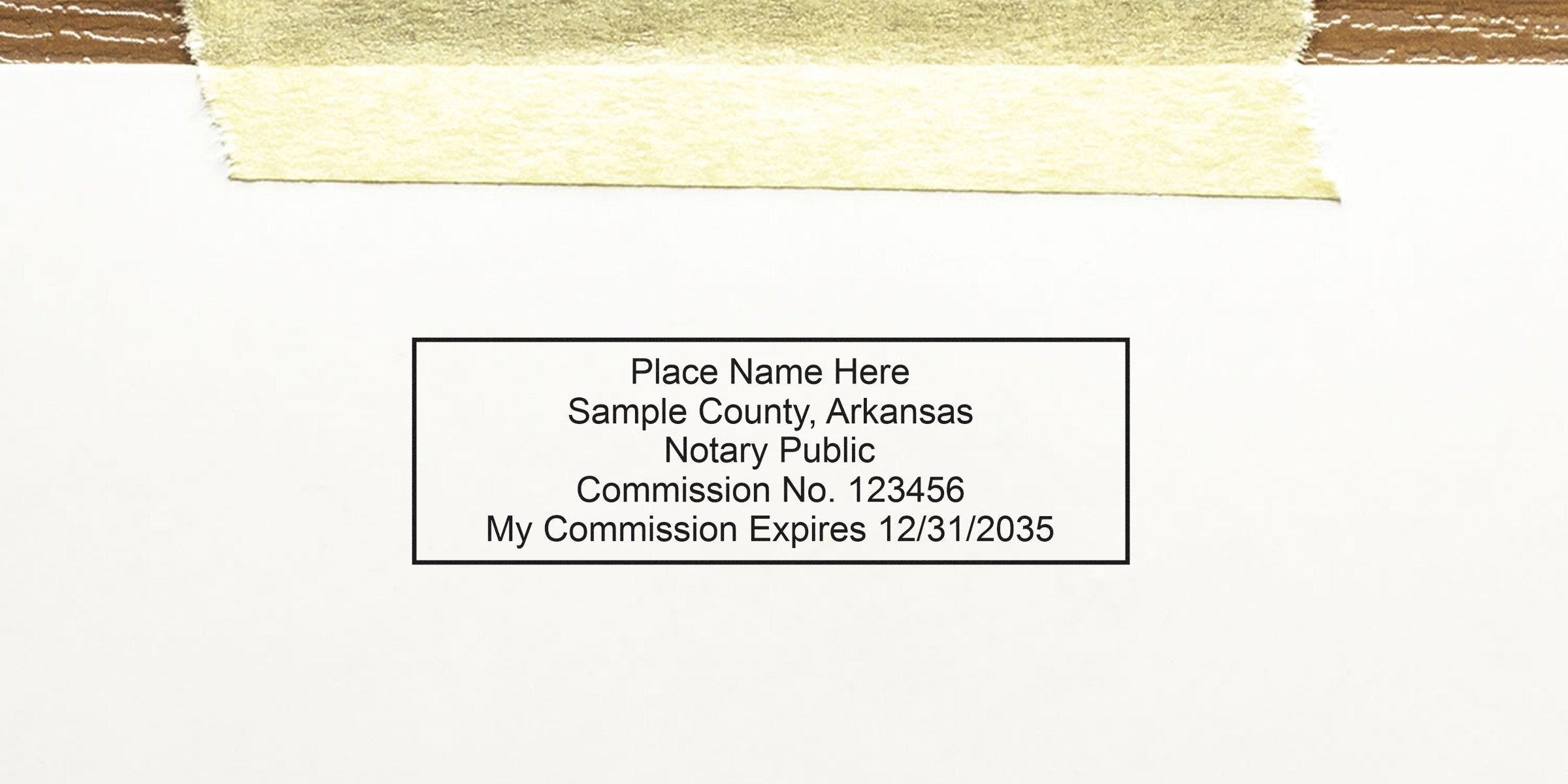 Arkansas Notary Stamp with commission number and expiration date on white paper, shown in Notary Stamp Buying Guide.