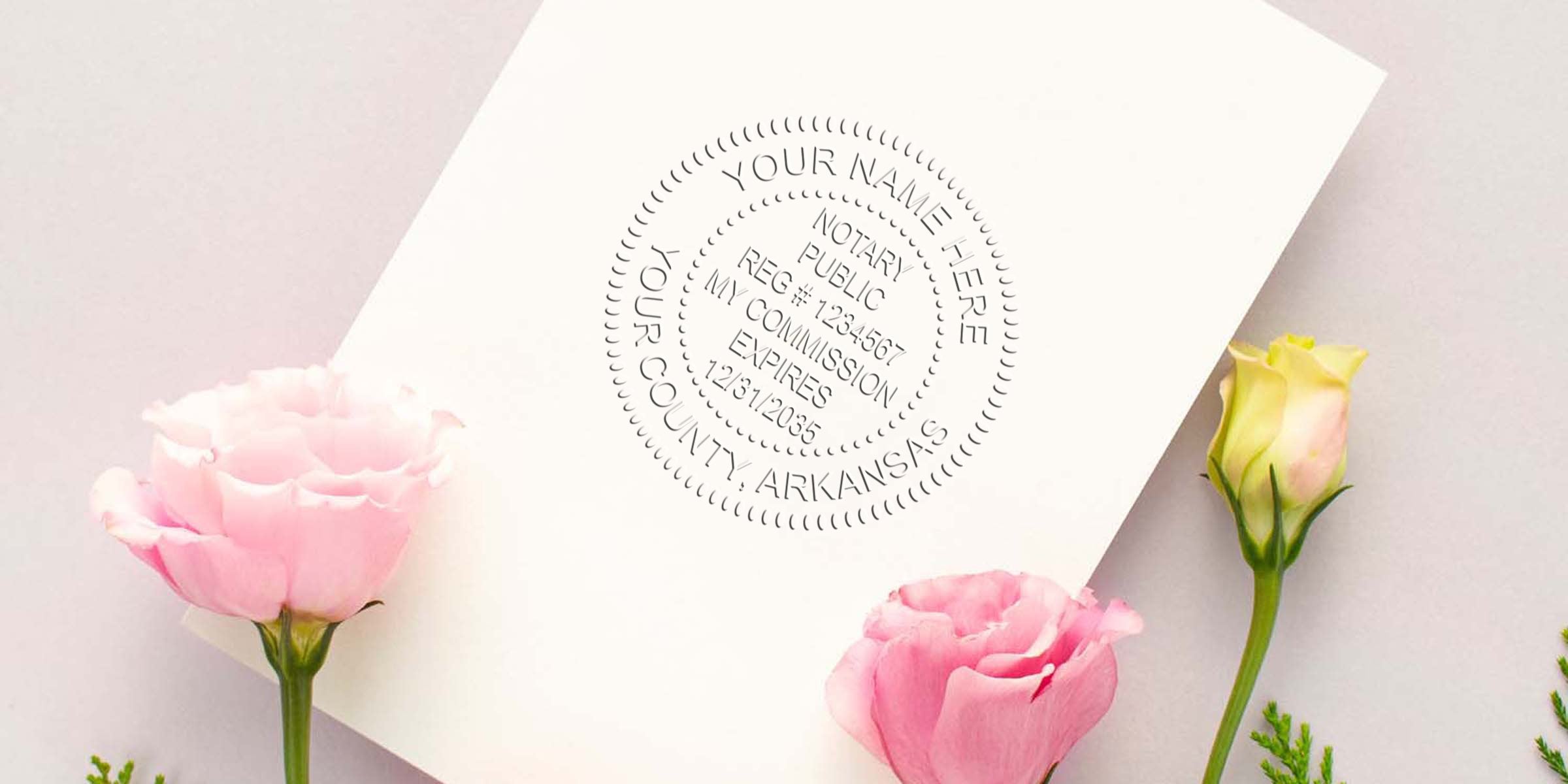 Arkansas notary stamp with affordable seal on white paper, adorned with pink and yellow flowers, featuring Arkansas county notary commission design.