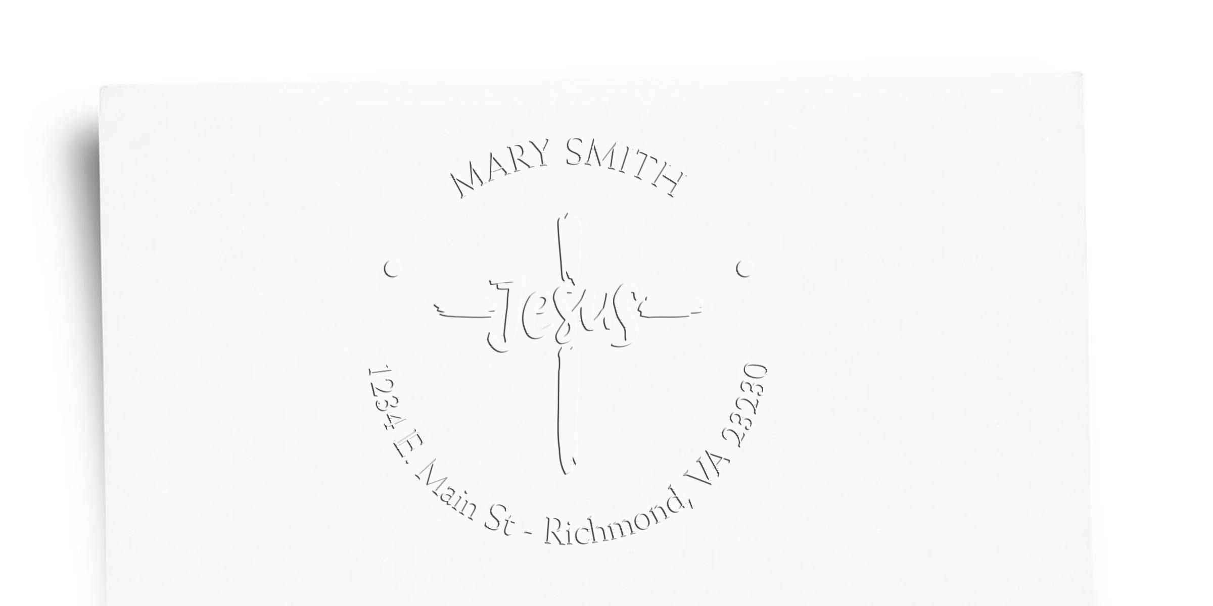 White Christian T-shirt with minimalist cross design, “Mary Smith” text, “Jesus” lettering, and church address 1234 E. Main St., Richmond, VA 23220.