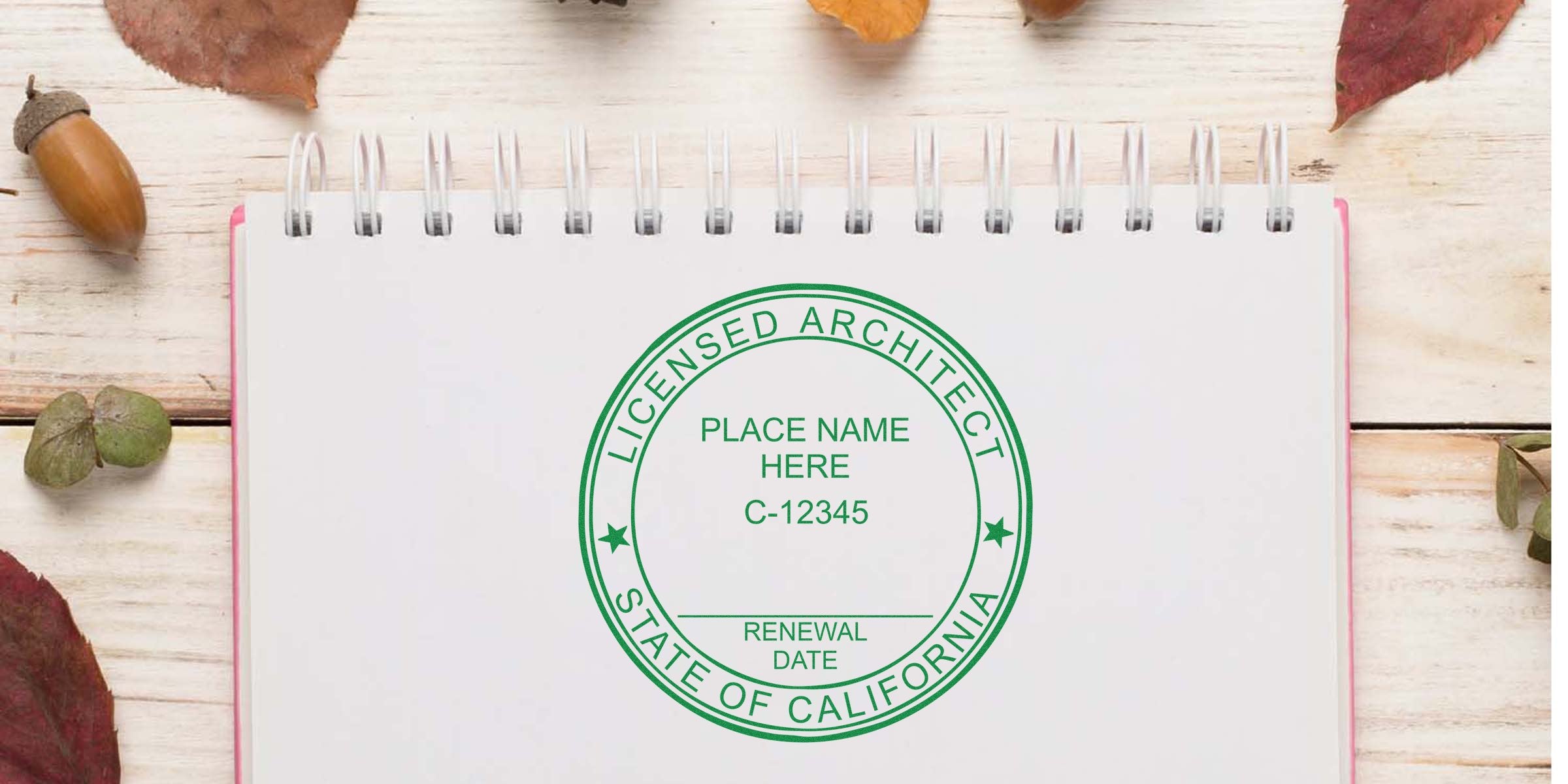 California architect seal stamped on notebook with autumn leaves and acorns, emphasizing legal work advantages.