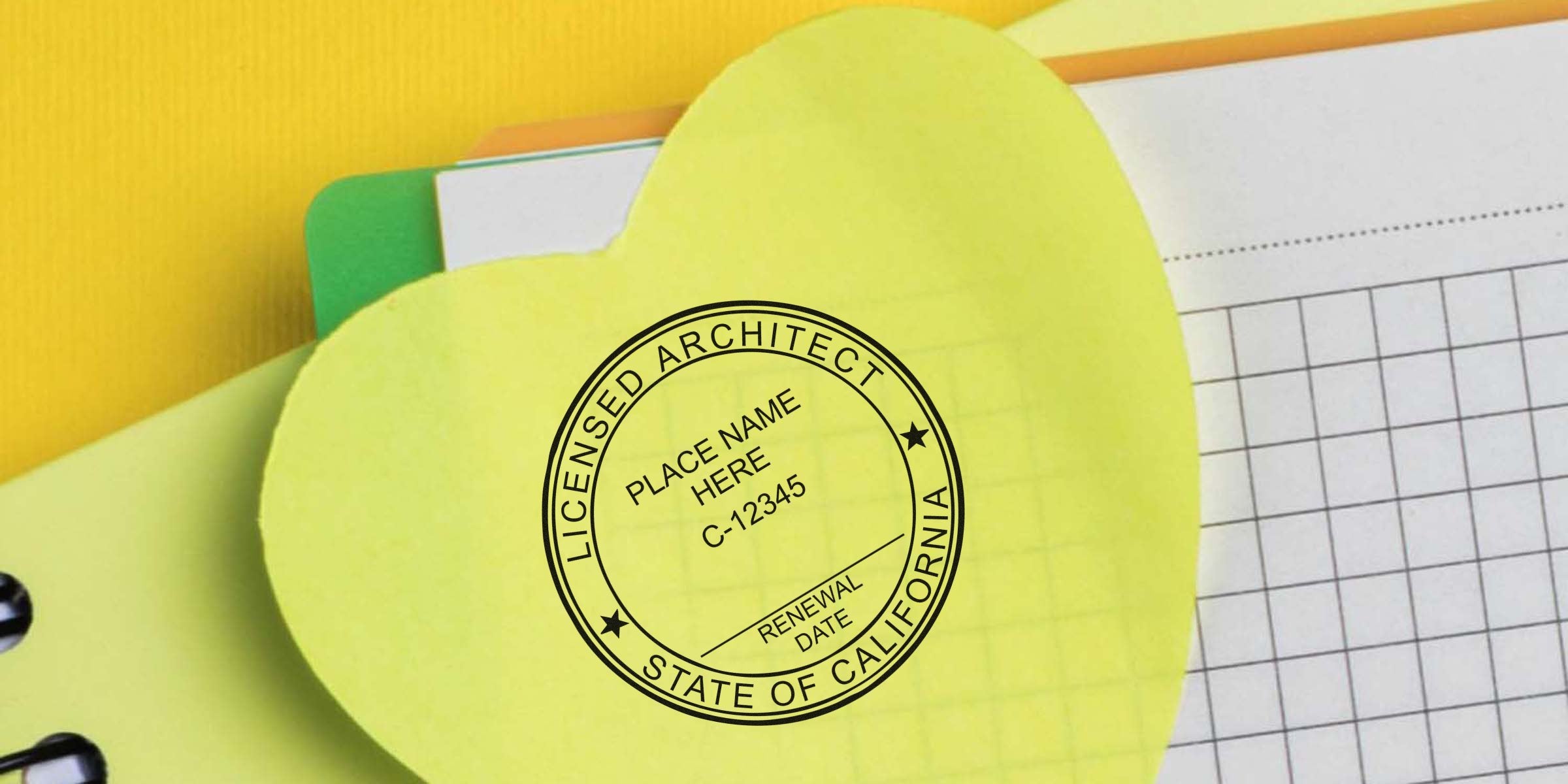 California architect stamp on yellow heart-shaped paper, set against office supplies, crafted to impress clients.