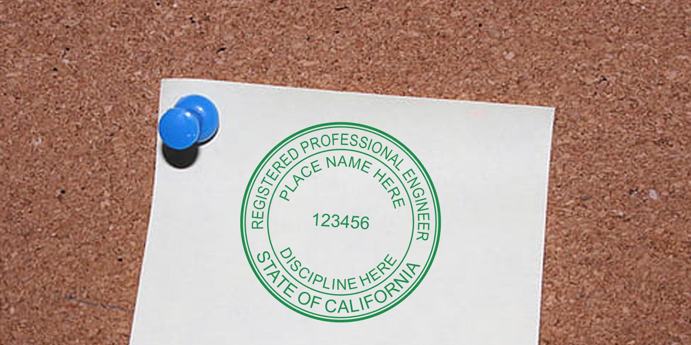 California PE License seal pinned on corkboard, confirming professional engineering certification.