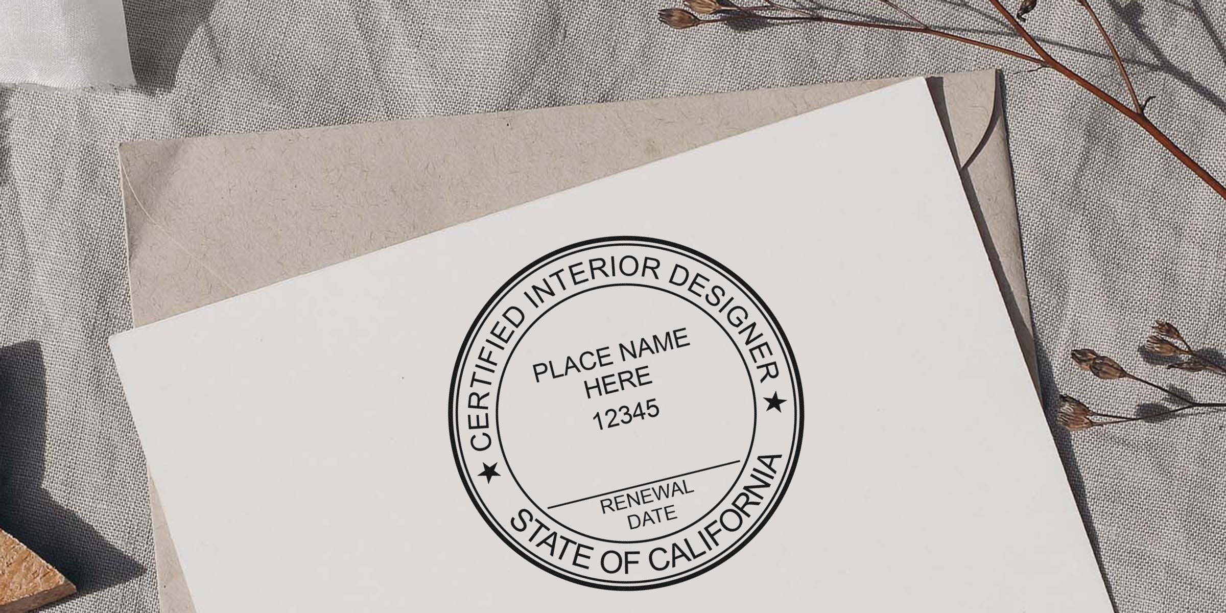 Certified interior designer stamp on paper with California embossers and seal embossing services for renewal date.
