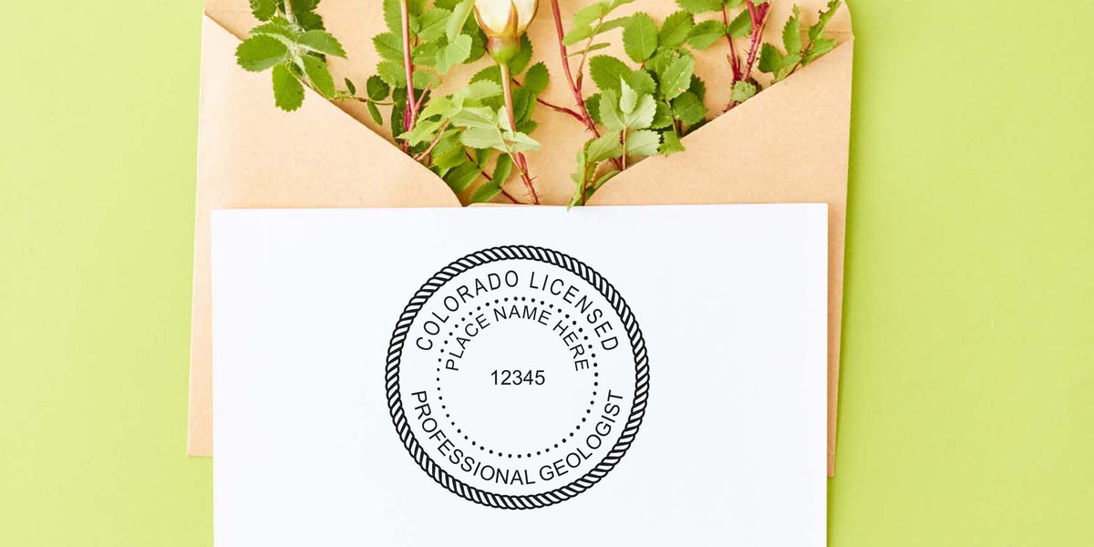 Colorado geologist seal stamped on white paper showing seal details, set against a floral envelope background.