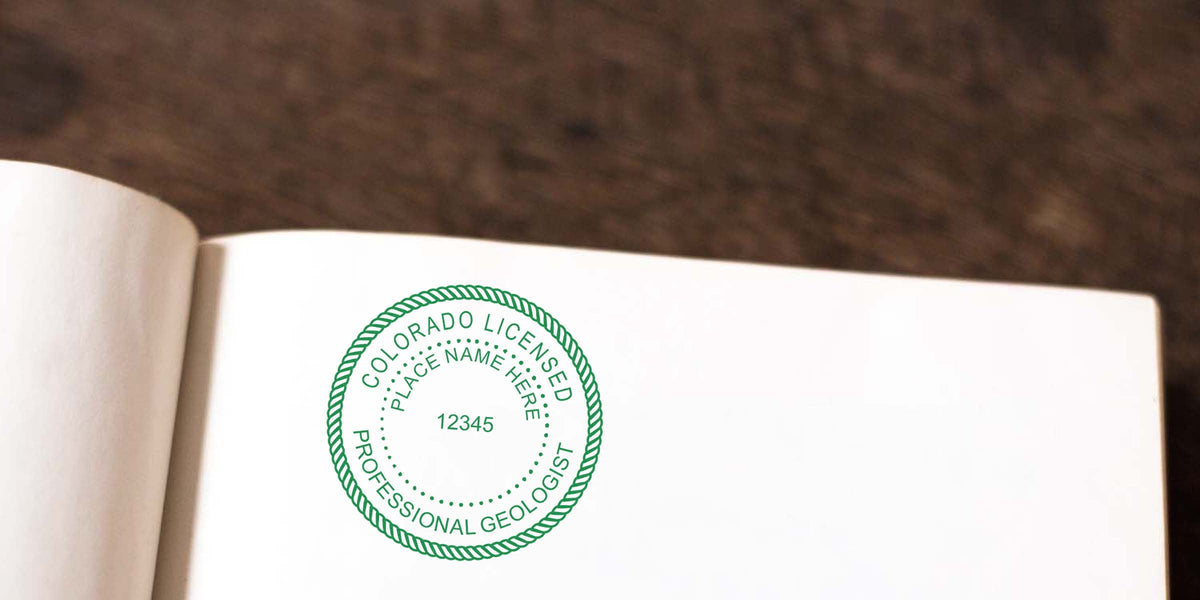 Colorado geologist seal embossed on white paper, showing the licensed professional geologist stamp and embosser guide details.