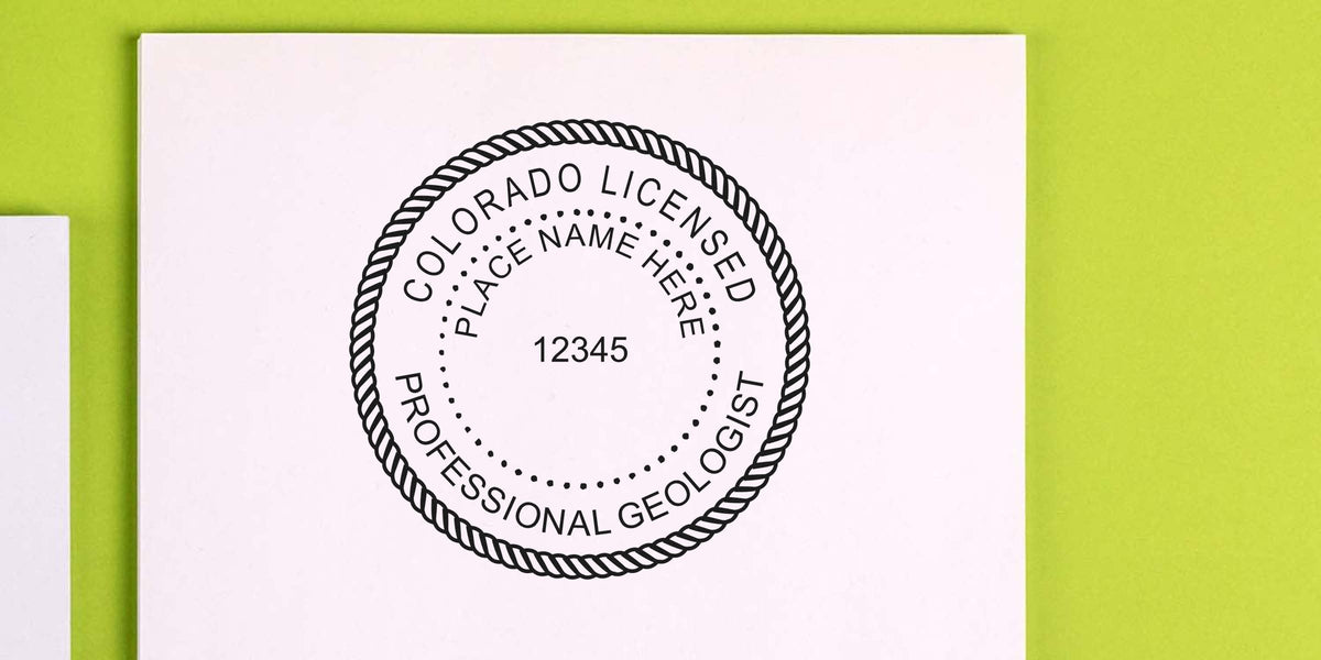 Colorado licensed professional geologist seal on white paper with name and license number, on green background, related to Colorado Geologist Stamp and License Renewal.