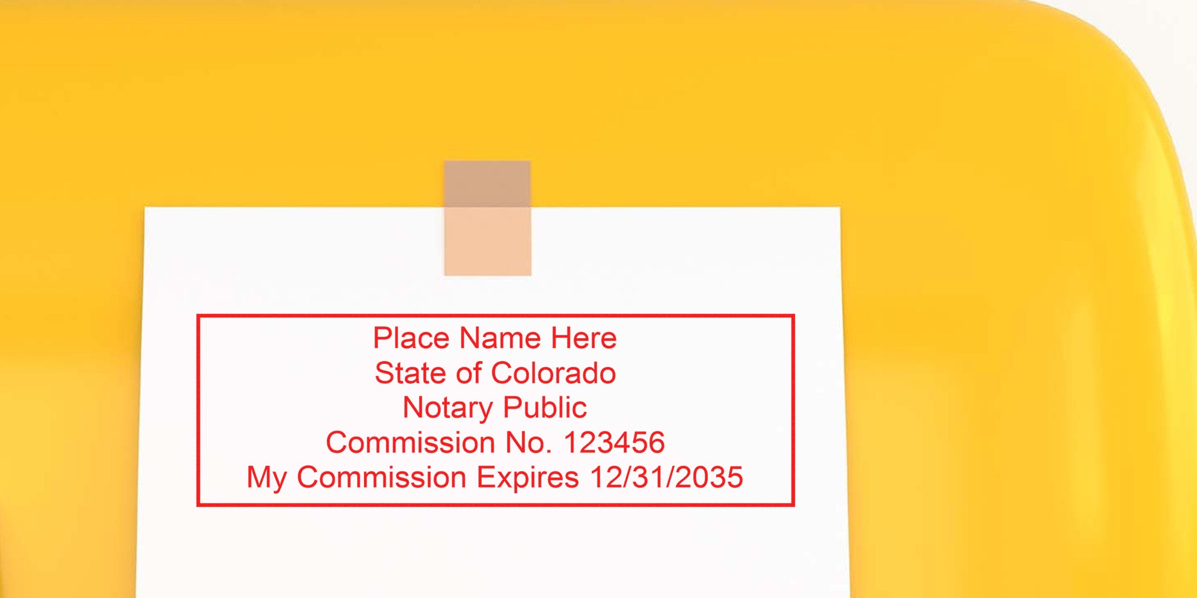 Colorado notary public commission certificate with expiration date and notary stamp, shown on yellow background with Colorado notary supplies.