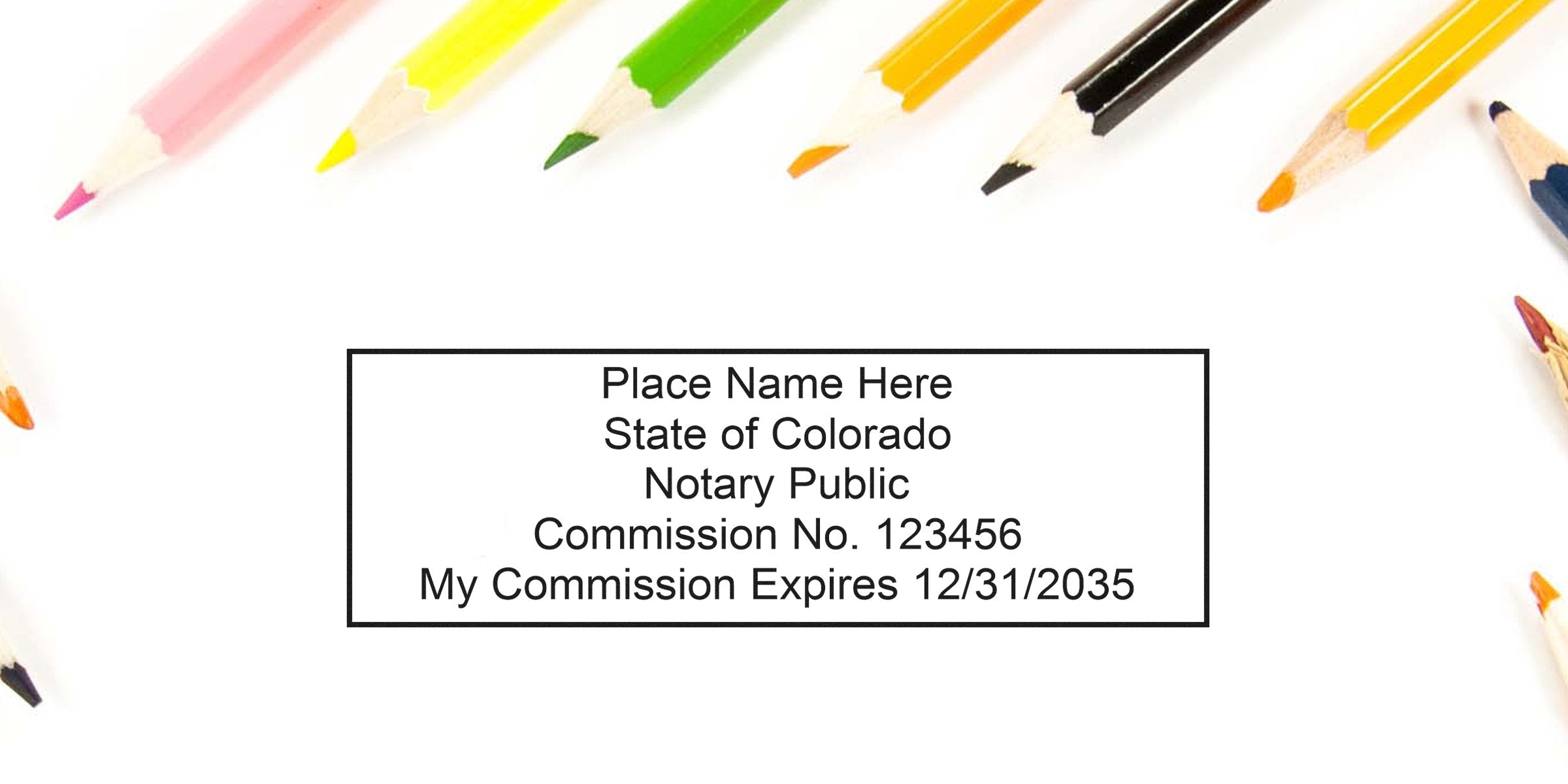 Colorado notary public stamp with commission number and expiration date, surrounded by colored pencils, highlighting quality notary tools and CO notary supplies.