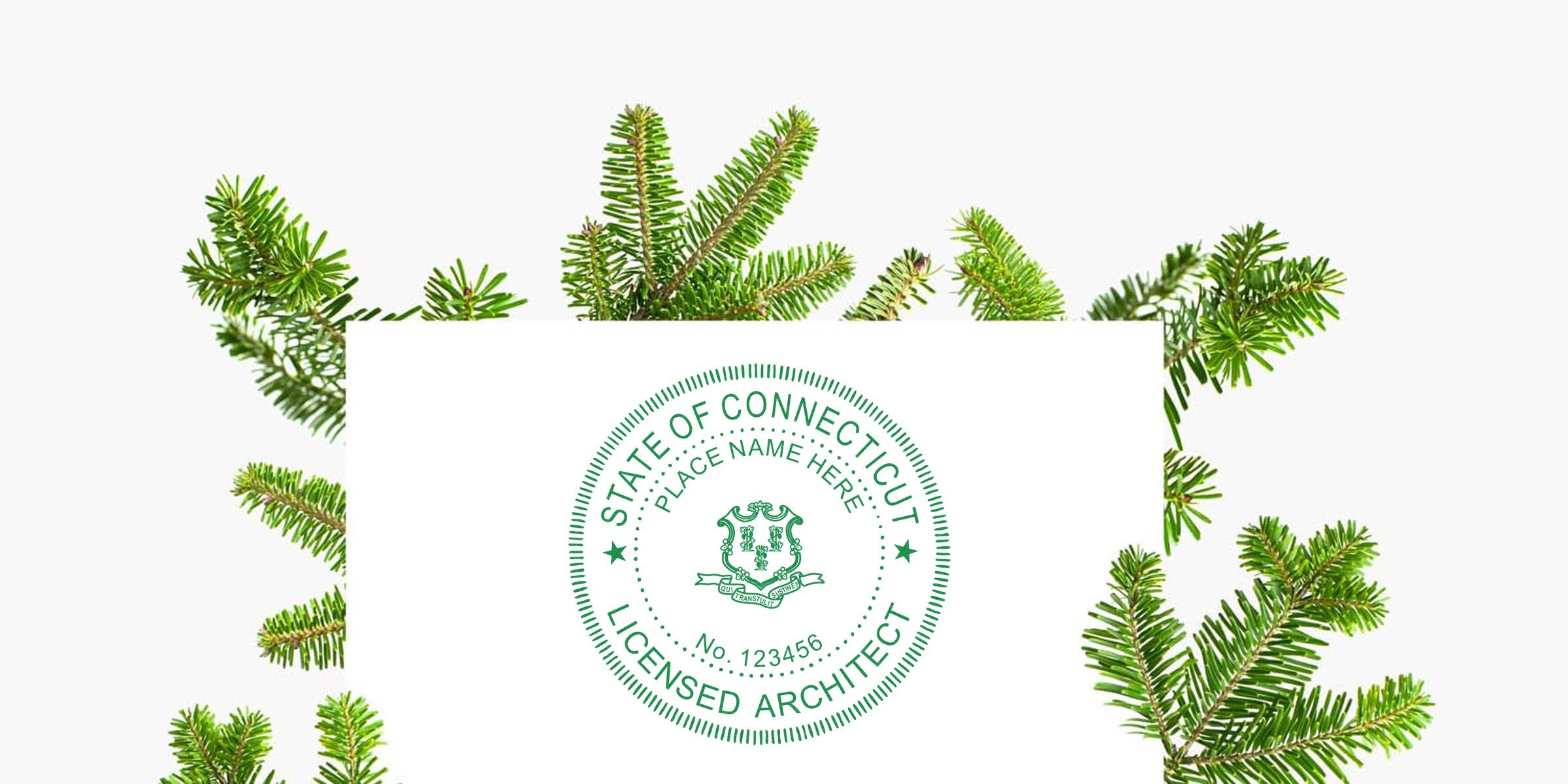 Connecticut architect seal on green fir branches, showcasing the cost and value of a Connecticut architect stamp.