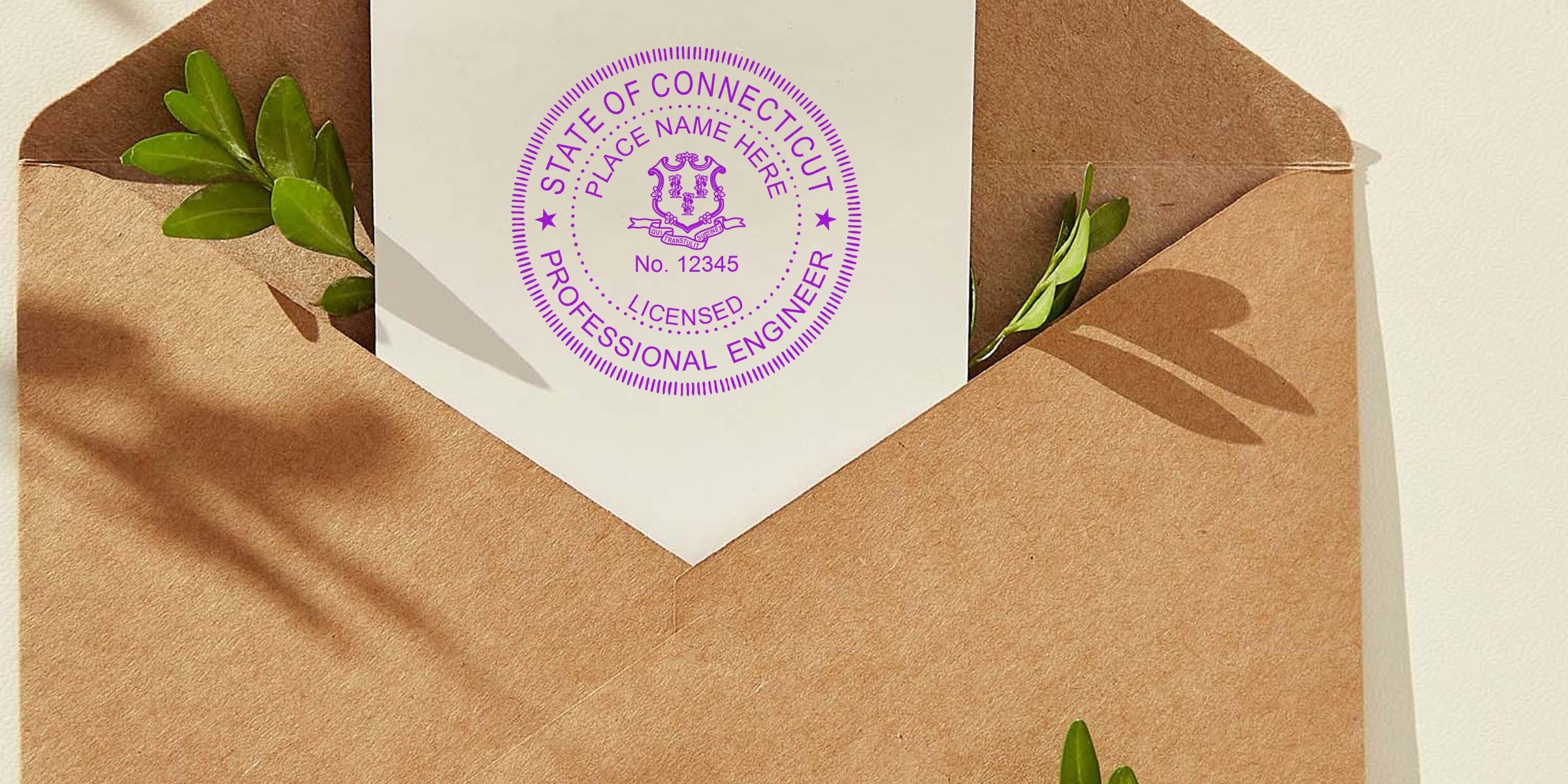 Connecticut PE stamp on engineer license, white paper inside brown envelope with green leaves, emphasizing choosing PE stamp in Connecticut.