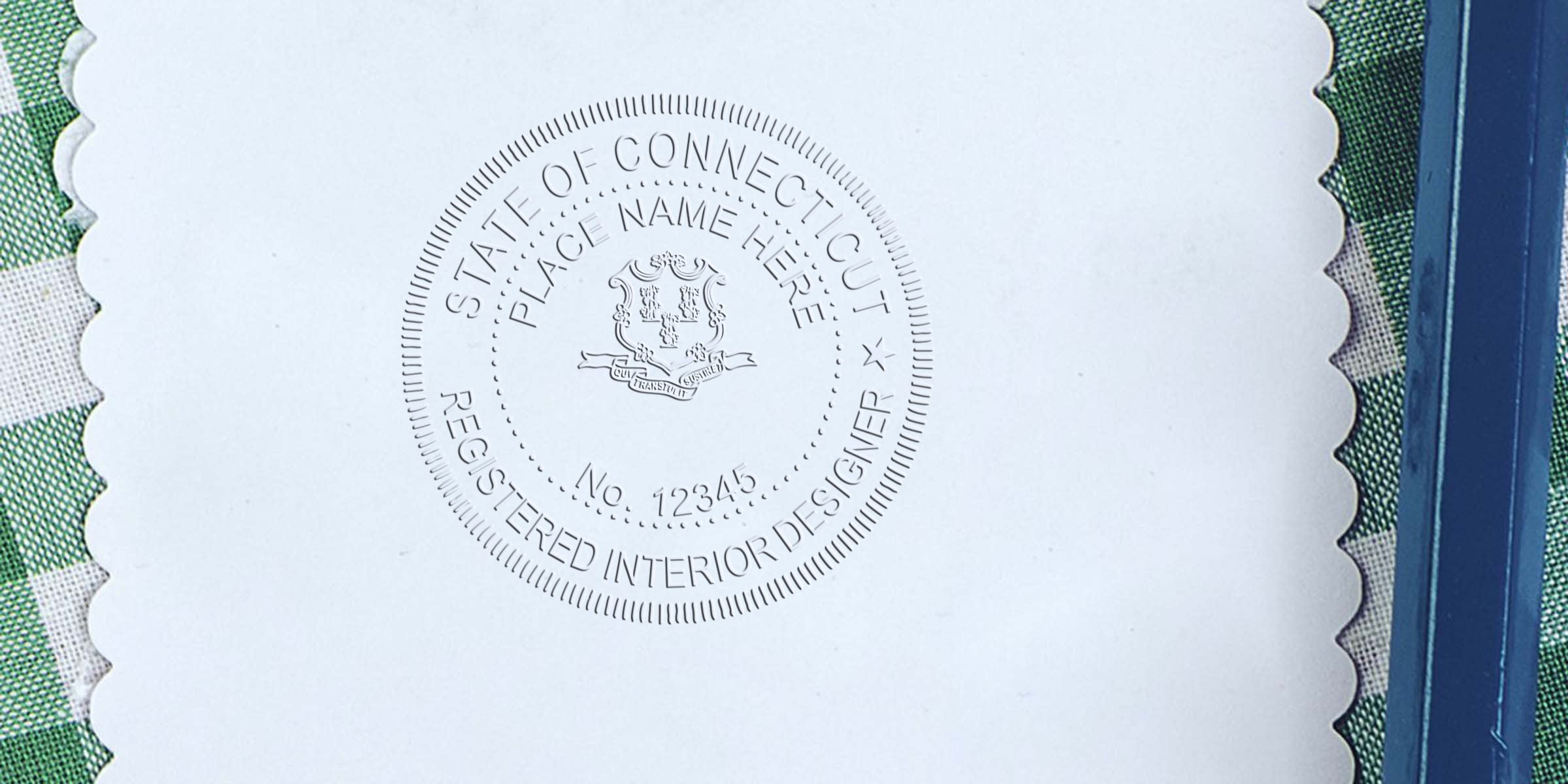 Connecticut interior designer seal embossed on white certificate paper, symbolizing CT interior design certification.