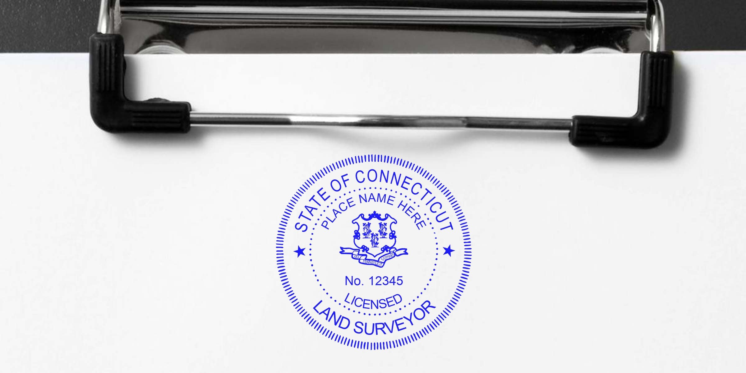 Connecticut land surveyor seal stamped on clipboard showing place name and license number, complying with land surveyor seal guidelines.