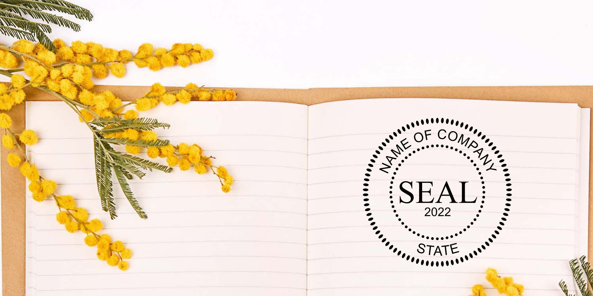 Open notebook with yellow mimosa flowers and green foliage surrounding a blank company seal template reading “Name of Company Seal 2022 State” on a clean white background