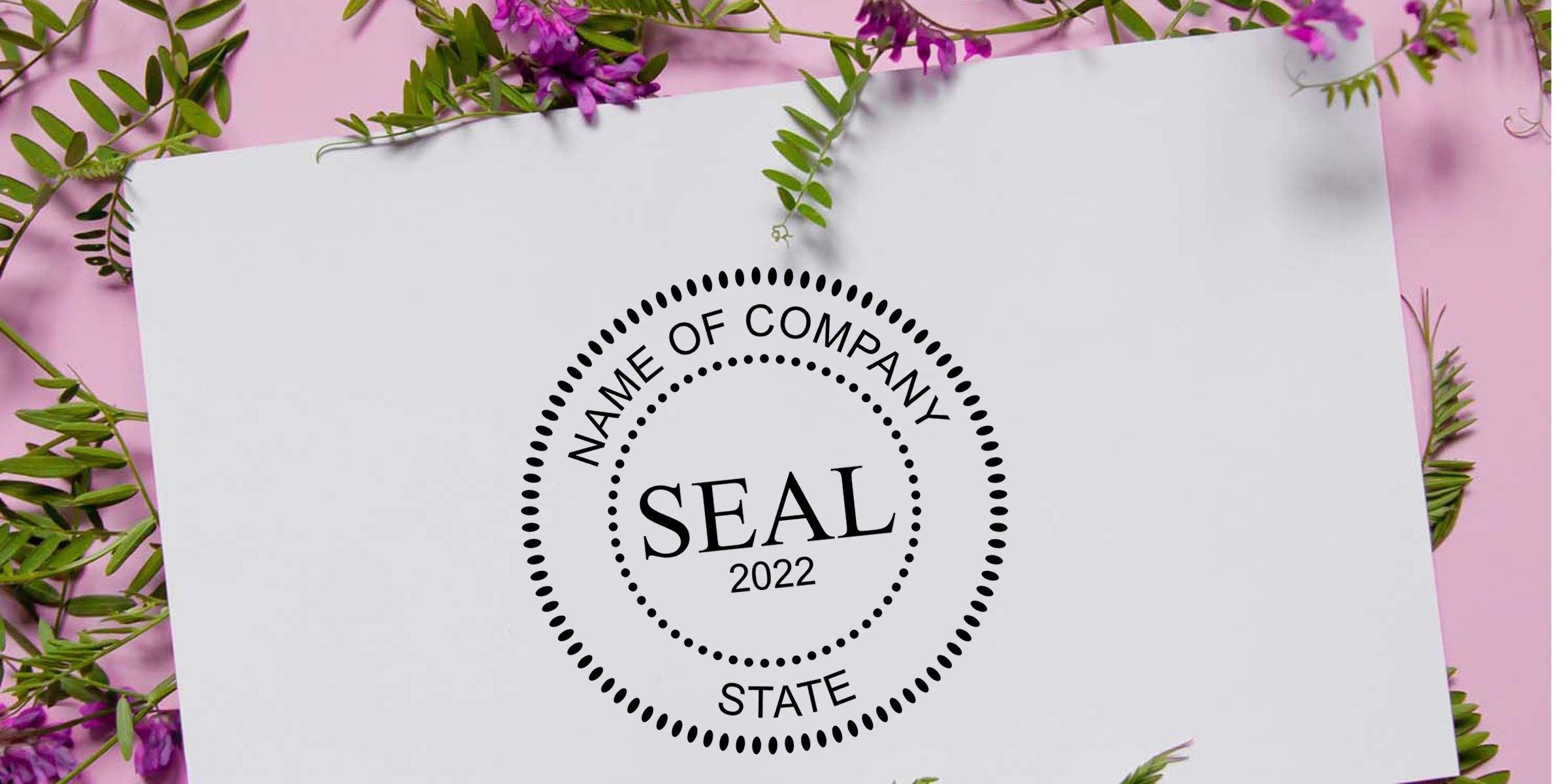 White paper featuring a circular company seal logo with “Name of Company Seal 2022 State,” surrounded by green leaves and purple flowers on a pink background