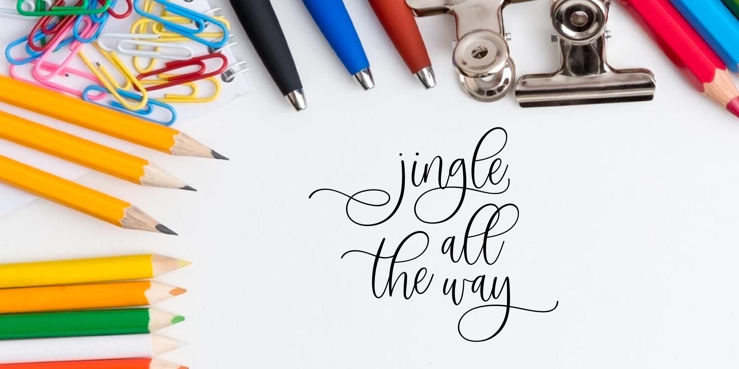Colorful stationery flat lay with pencils, pens, paper clips, binder clip, and “jingle all the way” calligraphy on a white background