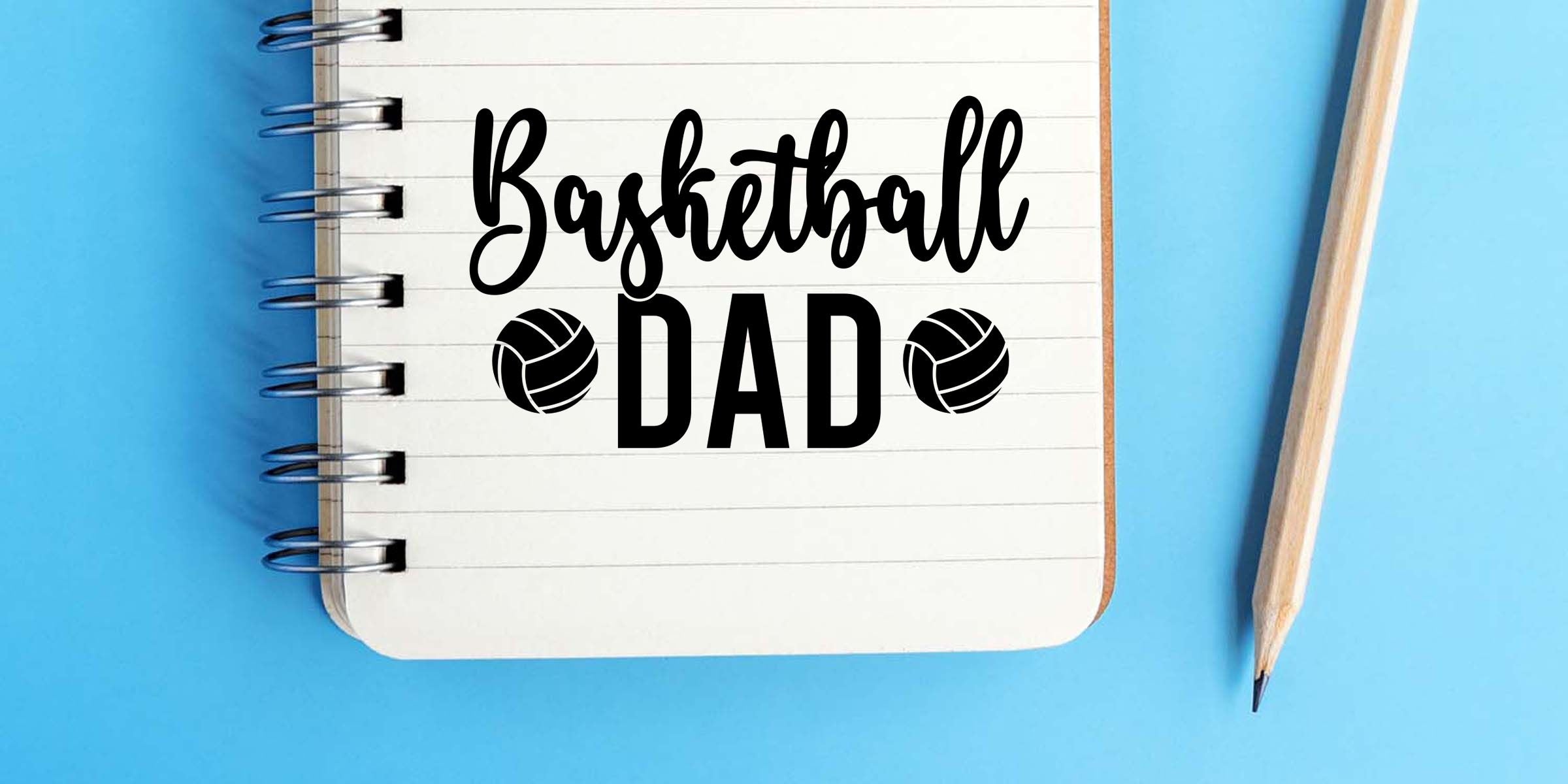 Basketball dad design on a spiral notebook with basketball icons and a pencil on a blue background