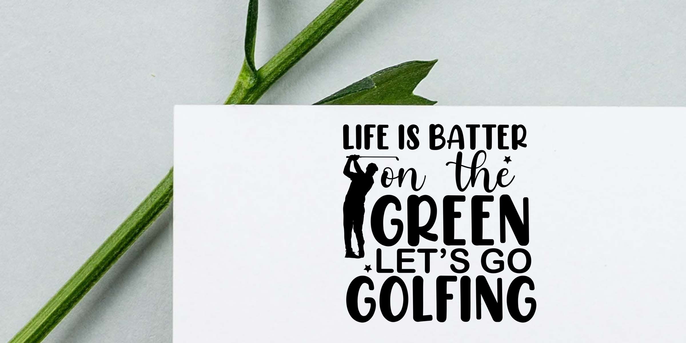 Golf-themed quote card with golfer silhouette and text reading “Life is batter on the green, let’s go golfing” on a white background with green stem accent.