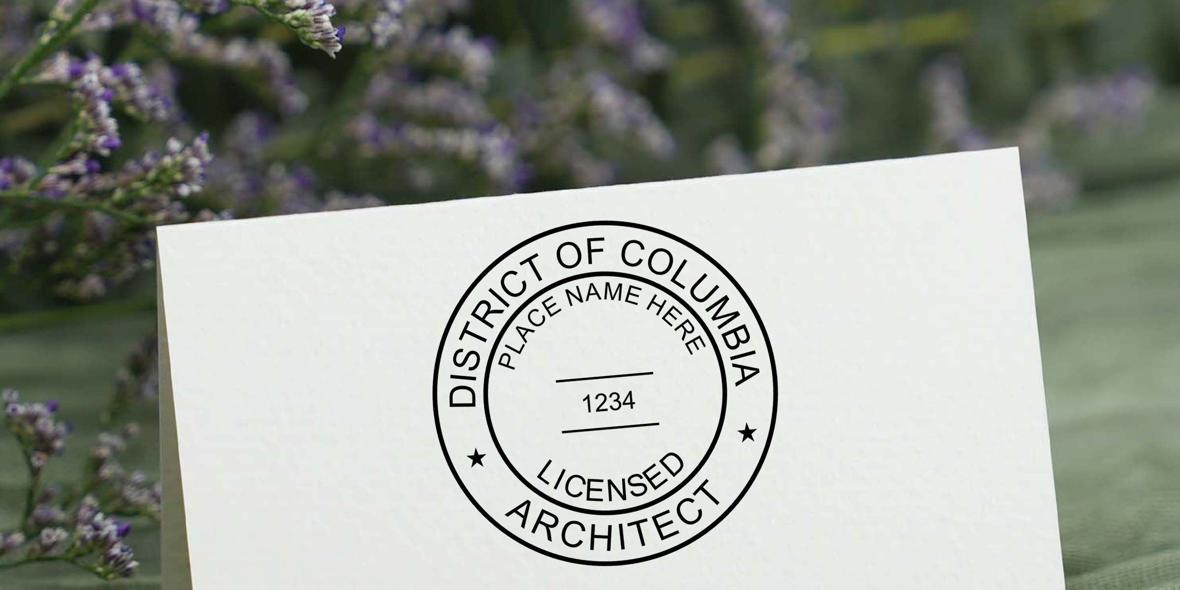 White business card featuring a District of Columbia Licensed Architect seal logo with placeholder text, set against a blurred purple flower background