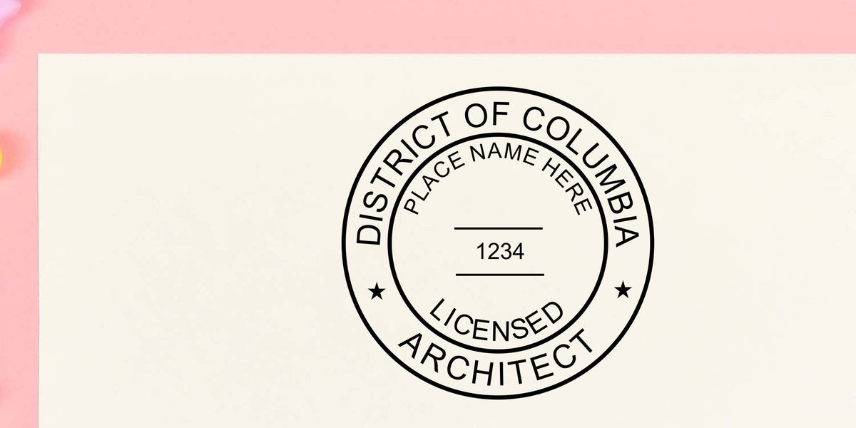 District of Columbia licensed architect seal stamp with place name placeholder and license number 1234 on a white document against a pink background
